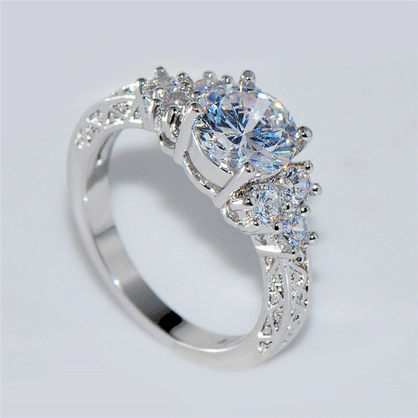 aVhMExquisite-Fashion-Silver-Color-Engagement-Rings-for-Women-Fashion-White-Zircon-Stones-Ring-Anniversary-Bridal-Wedding.jpg