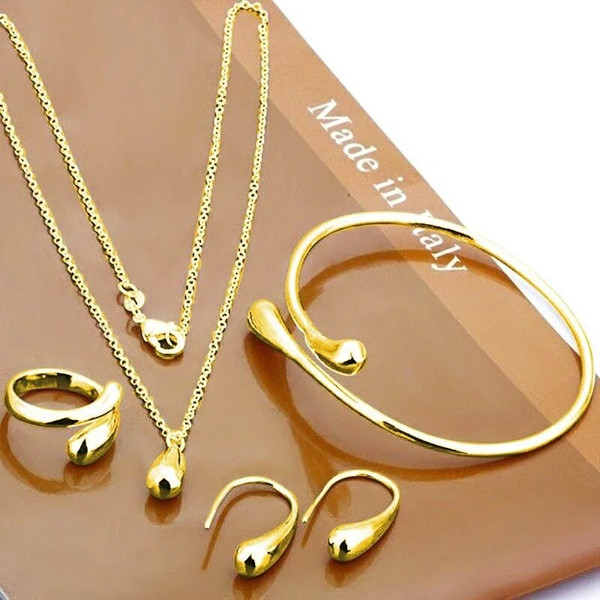 SlhUFashion-S925-Silver-Needle-Earrings-Ring-Bracelet-Set-Simple-Personality-Womens-Water-Drop-Four-piece-Jewelry.jpg