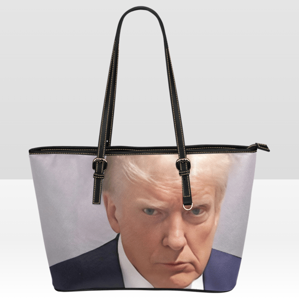 Trump mugshot Leather Tote Bag.png