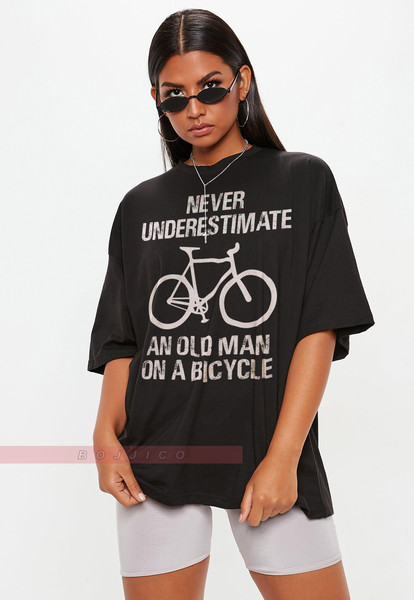 NEVER Underestimate An Old Guy On A Bicycle, Funny Cycling Gift Tee for Men, Dad or Grandad Present, Old Guy T Shirt,Cyclist Father's Day.jpg
