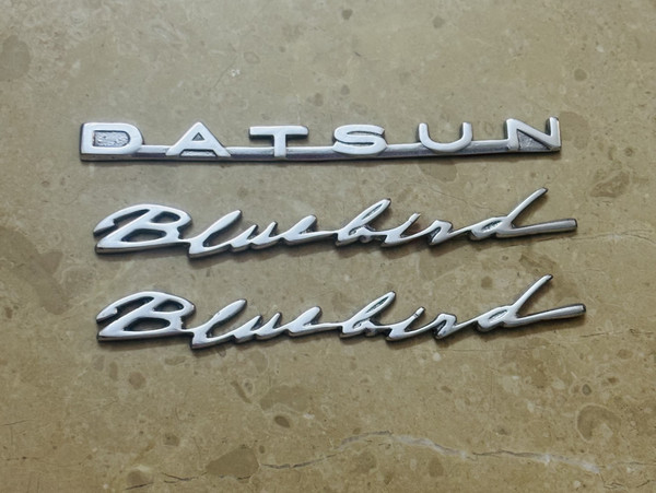 Datsun Bluebid 3 Piece Emblem Set 2.jpg