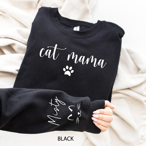 Custom Cat Mama Sweatshirt with Pet Name on Sleeve, Cat Mom Sweater, Personalized Cat Paw, Mothers Day Gift, Gift for Cat Lovers, Kitty Mom 1.jpg