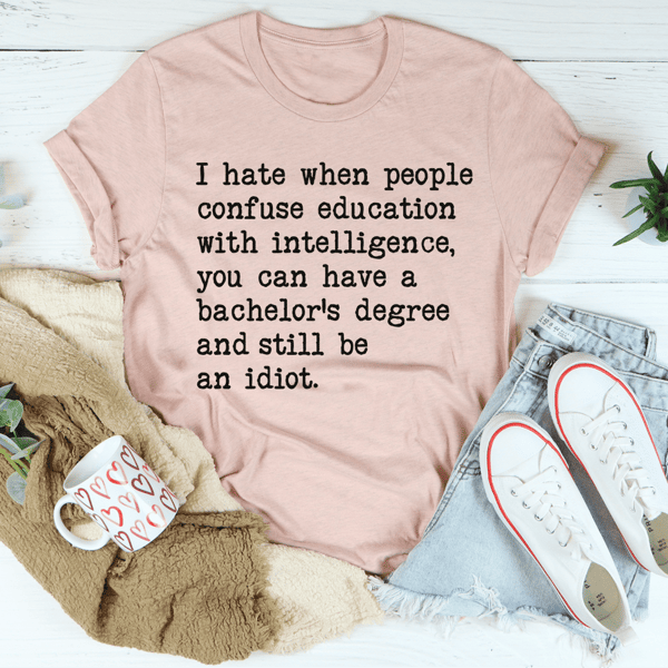 Don't Confuse Education With Intelligence Tee4.png