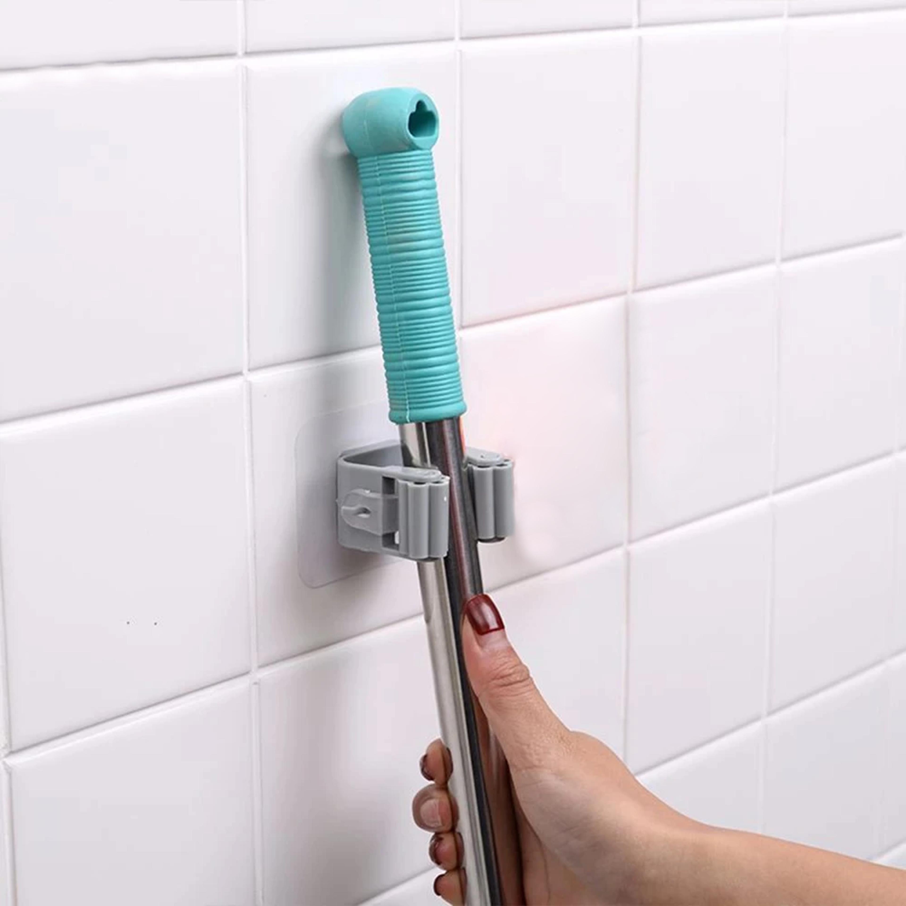 wall-mounted mop and broom holder adhesive no-drill utility organizer grip