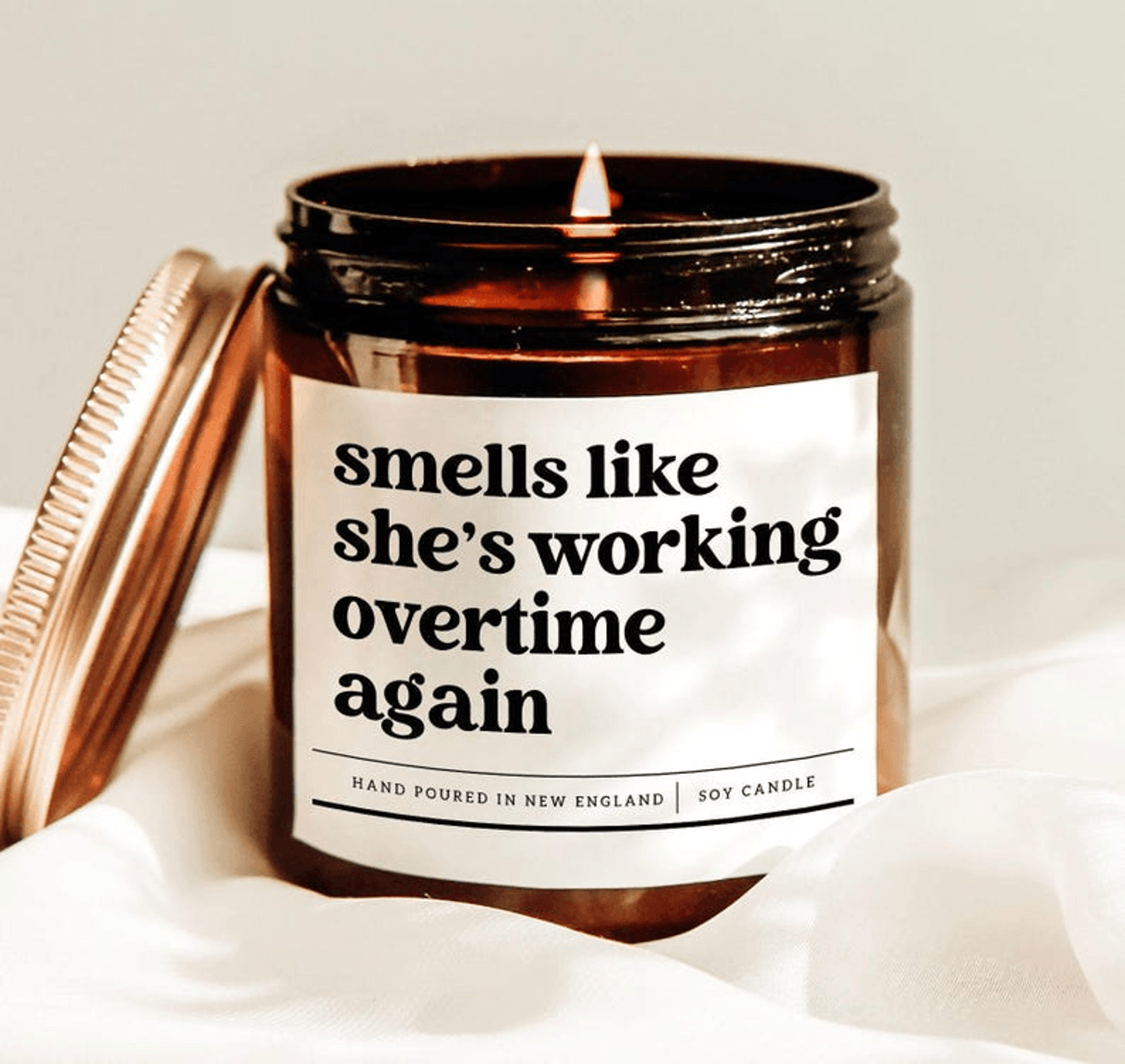 smells like she's working overtime again funny coworker candle gift