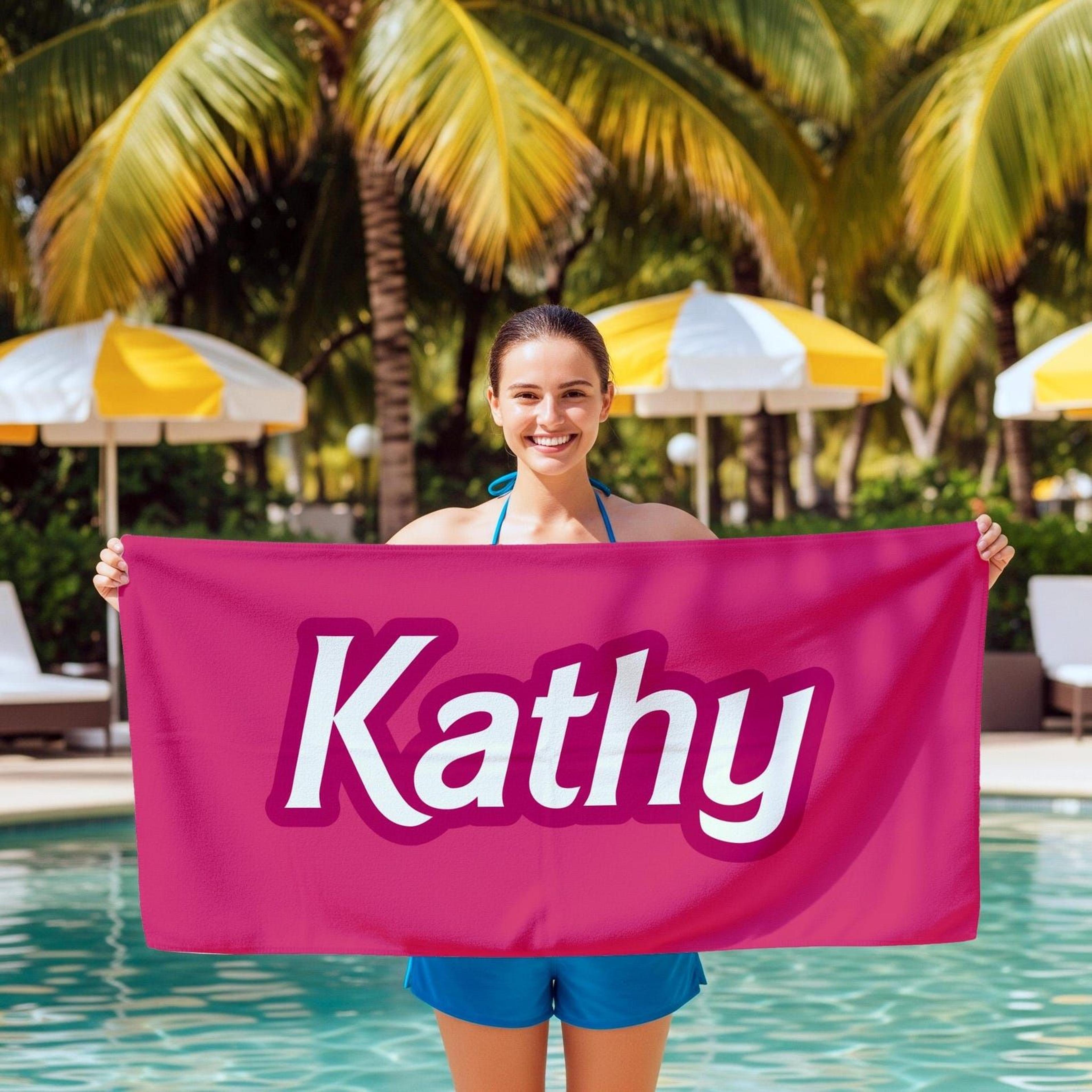 personalized pink beach towel with custom name | retro script pool & vacation towel