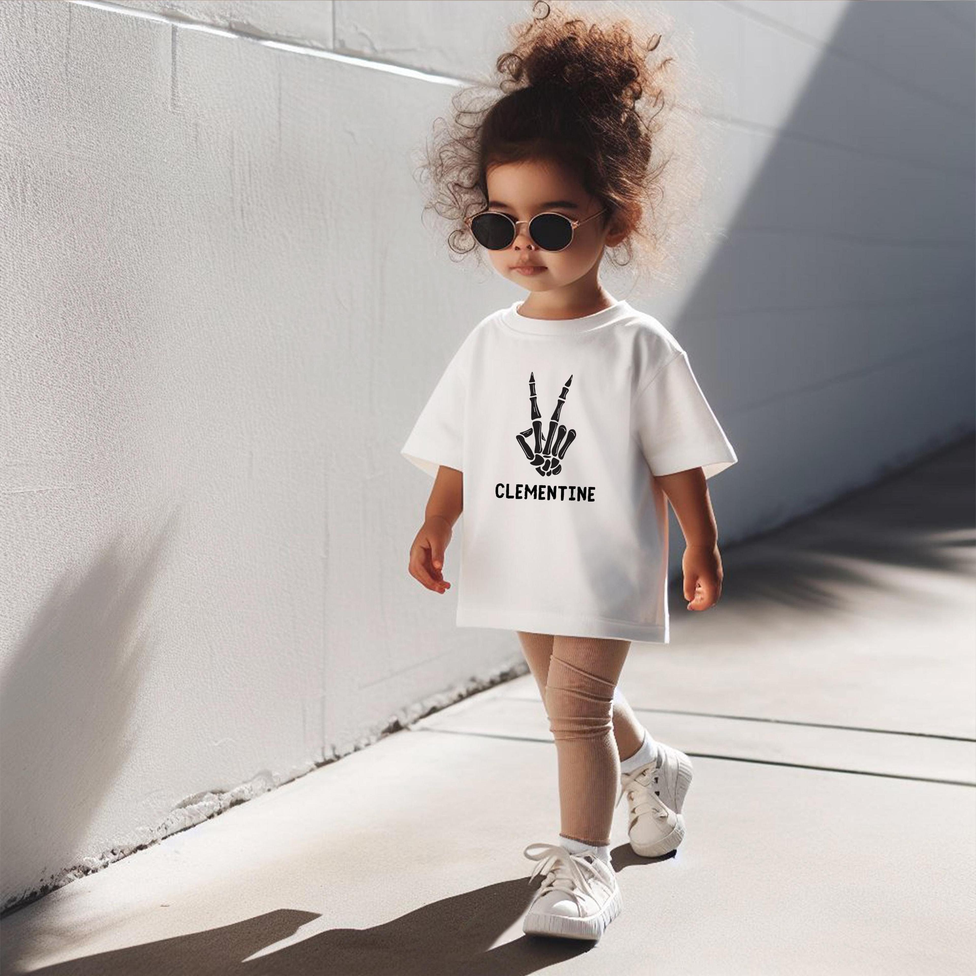 skeleton hand halloween shirt, neutral spooky season tee, minimal skeleton graphic shirt, cute fall halloween outfit, ki