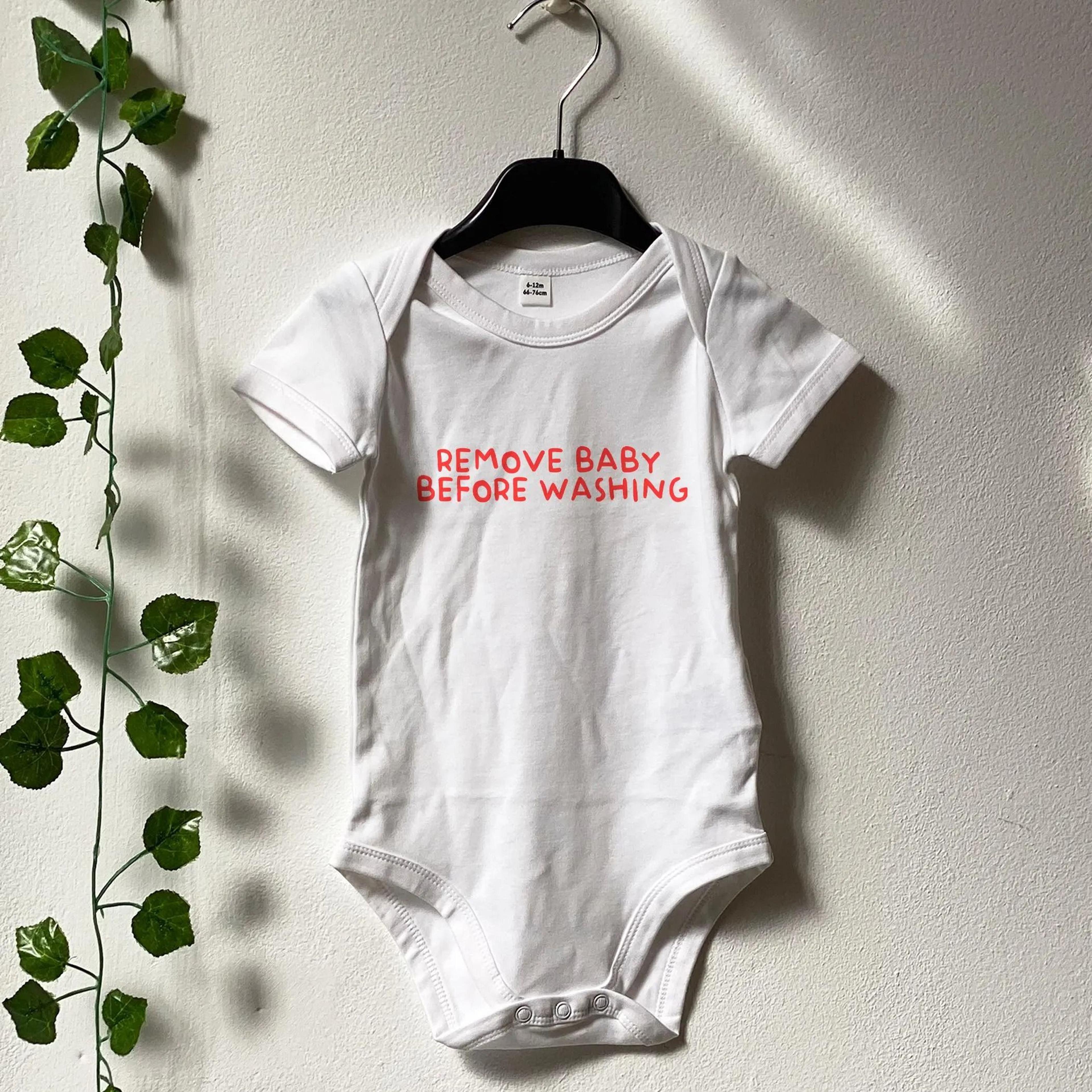 remove baby before washing bodysuit, funny baby onesie, new parent gift, humorous newborn outfit, baby shower gift