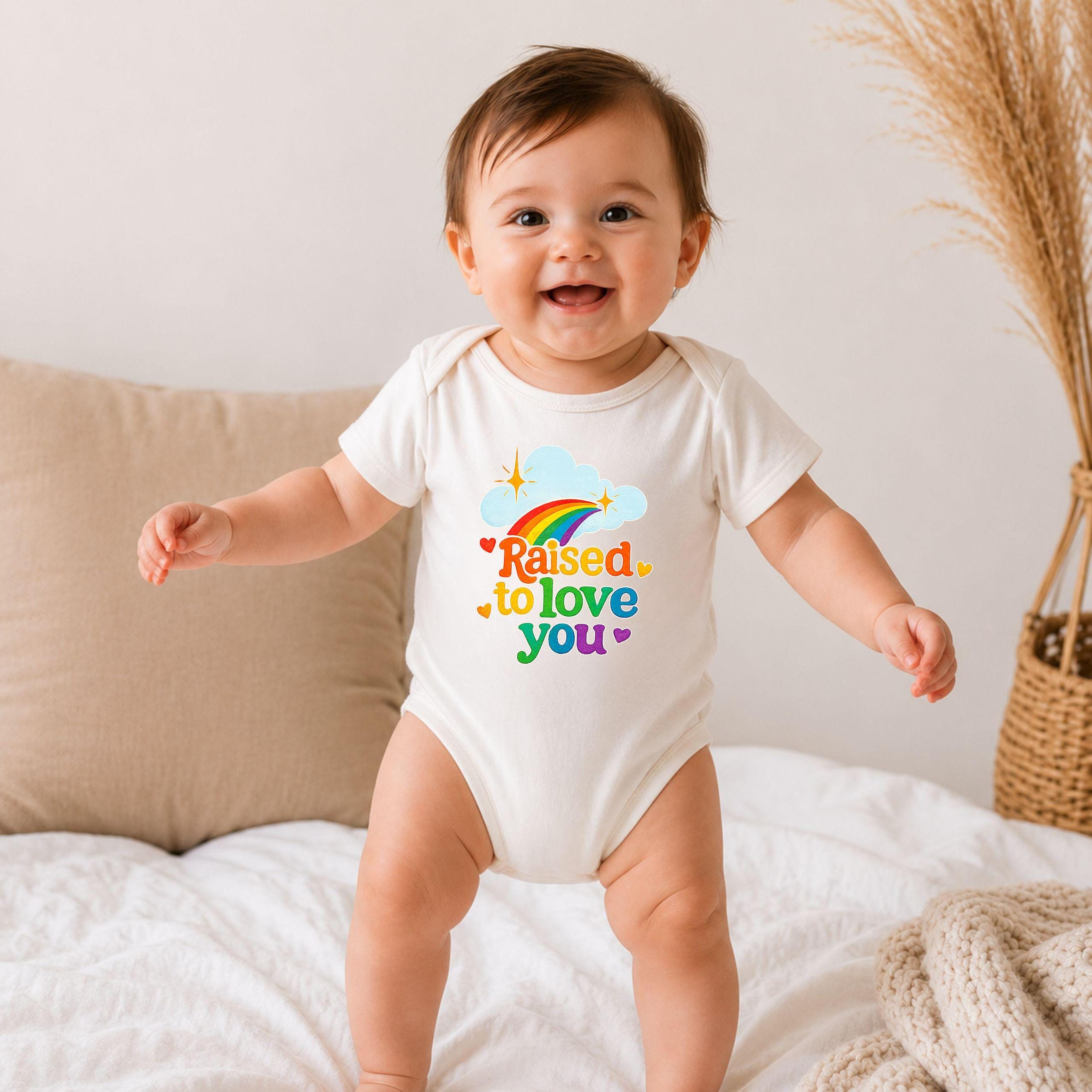 raised to love you pride baby onesie, rainbow lgbtq baby bodysuit, pride month newborn outfit, inclusive baby gift
