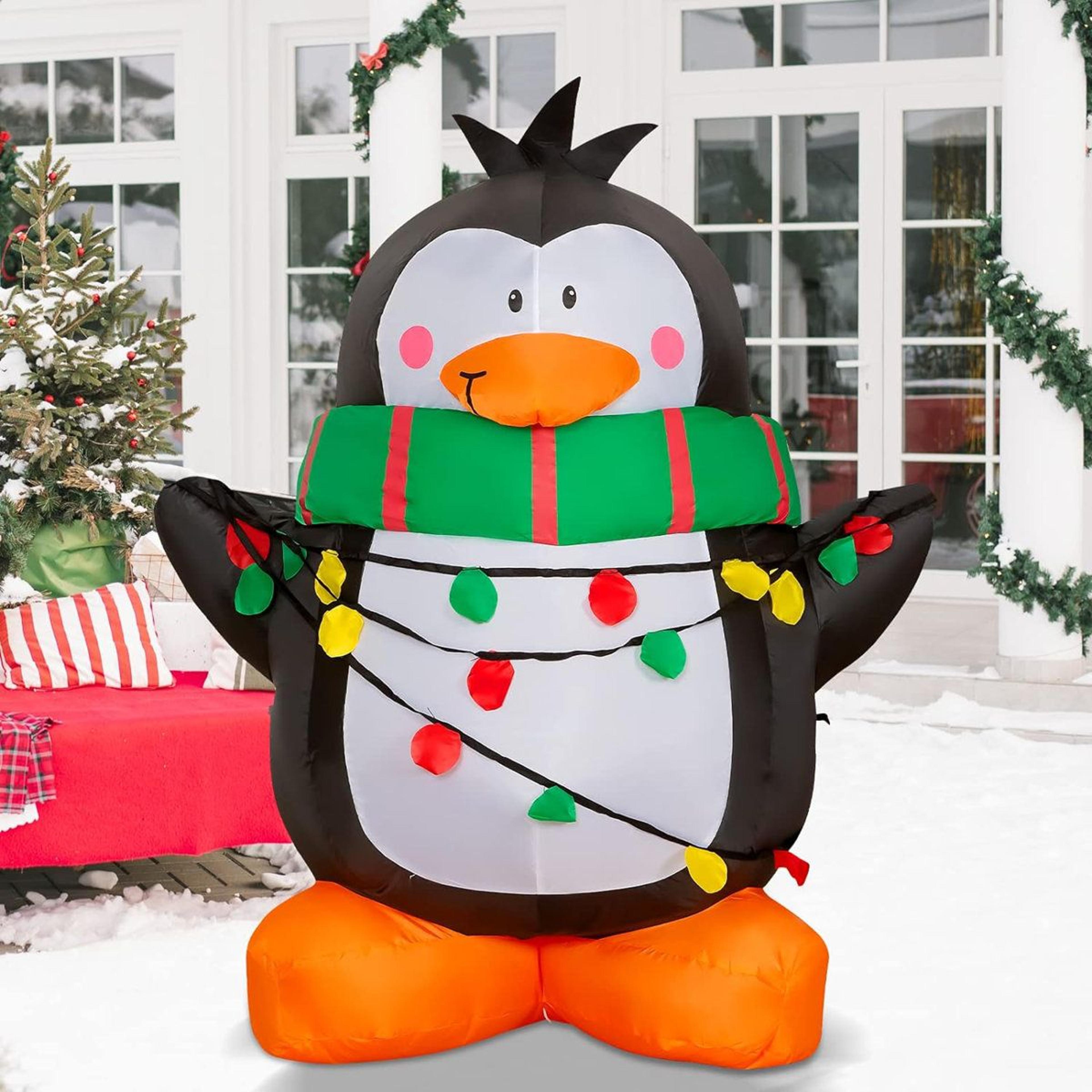 4 ft christmas inflatable penguin with green scarf and led lights