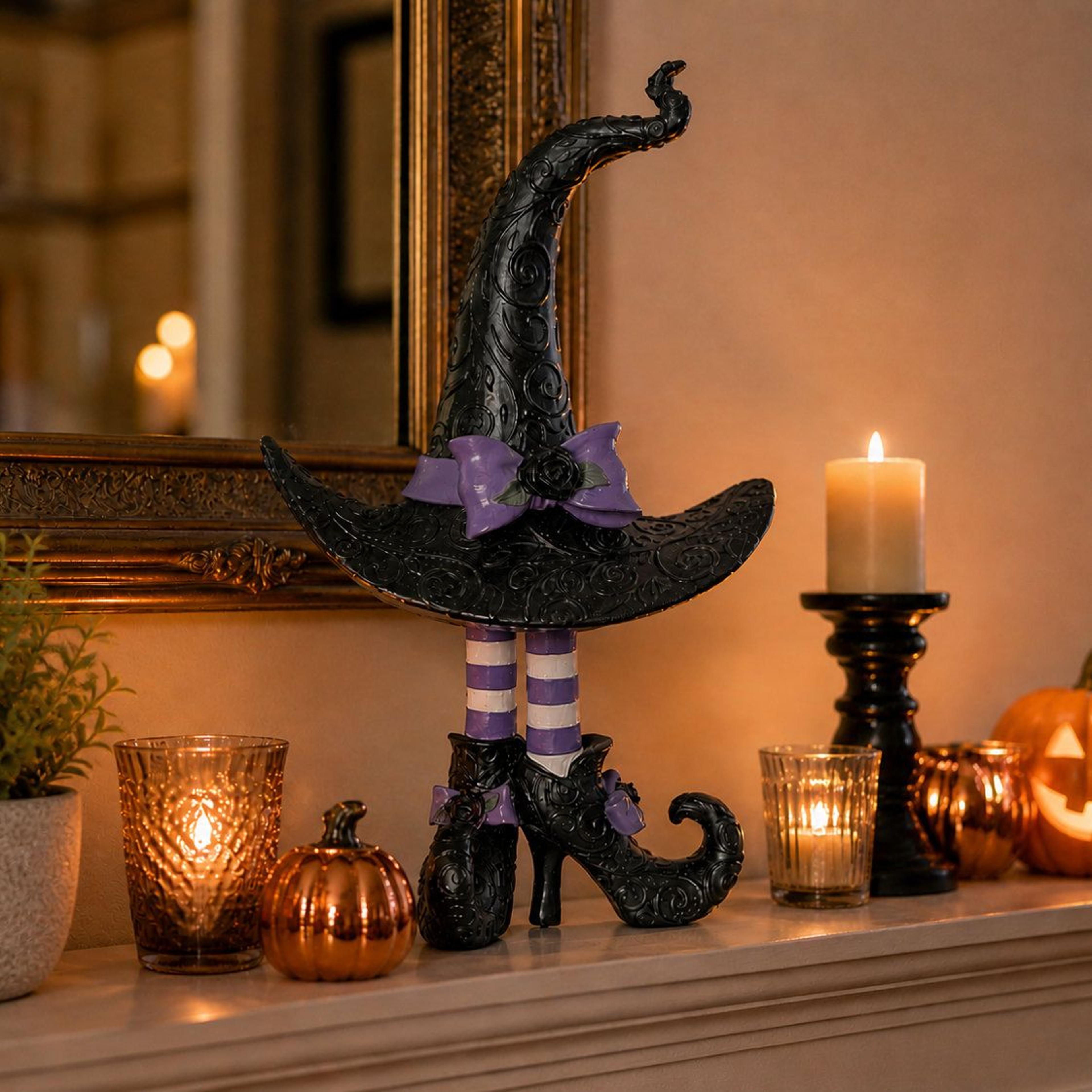 halloween witch hat and legs tabletop decor for spooky halloween displays