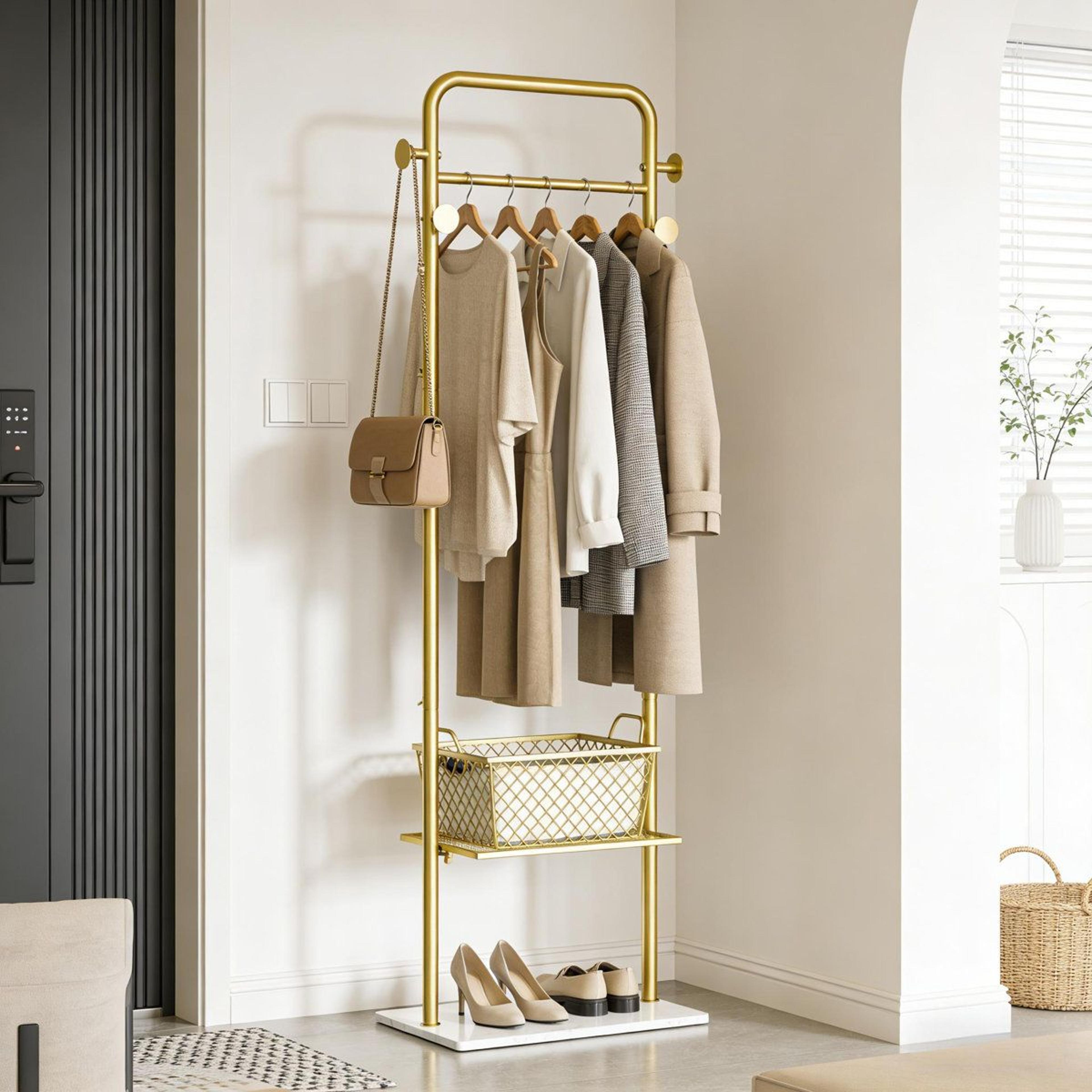 gold metal clothing rack with shelves hooks and granite base