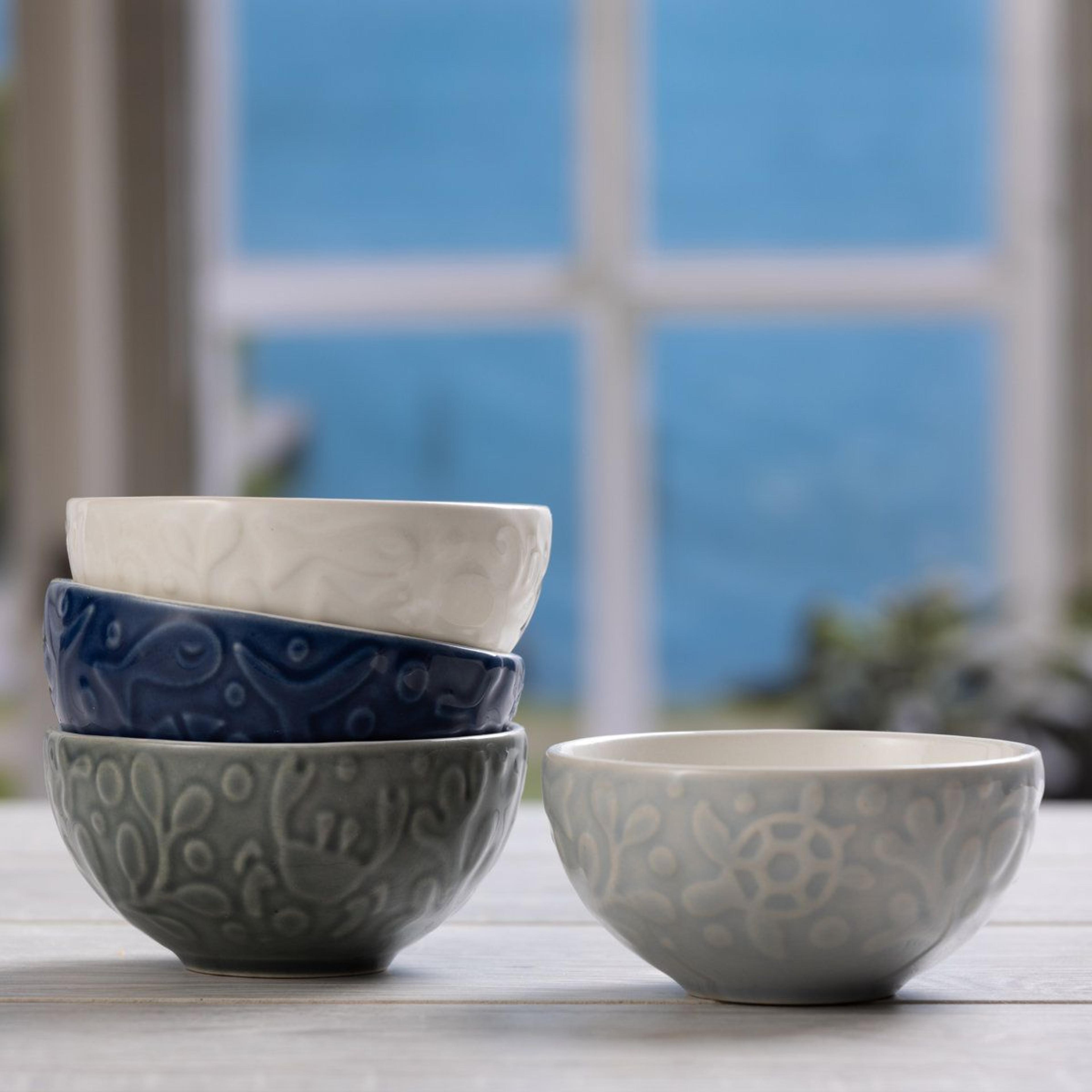 set of 8 stoneware preparation bowls with embossed nautical animal pattern