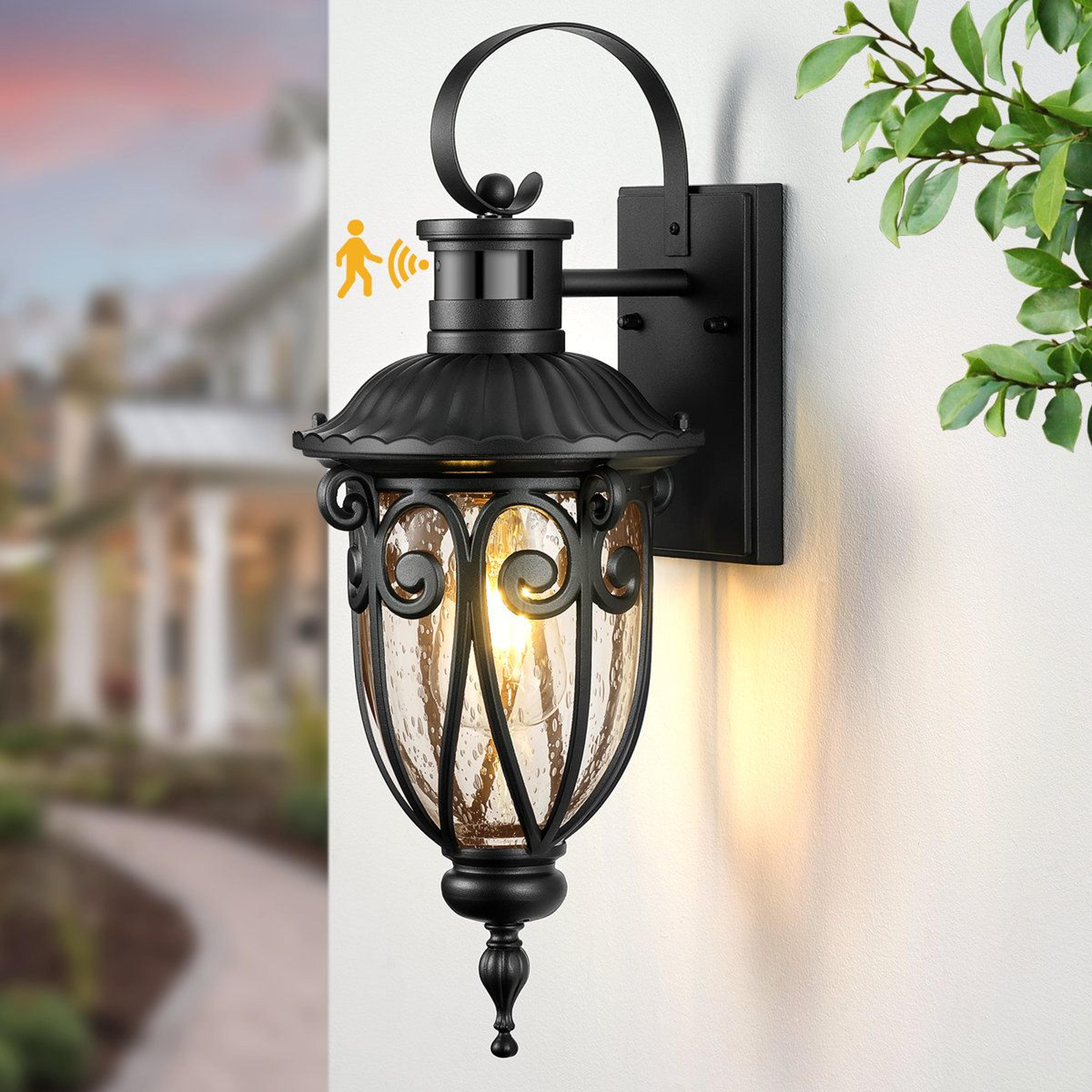 motion sensor outdoor wall lantern with seeded glass matte black finish