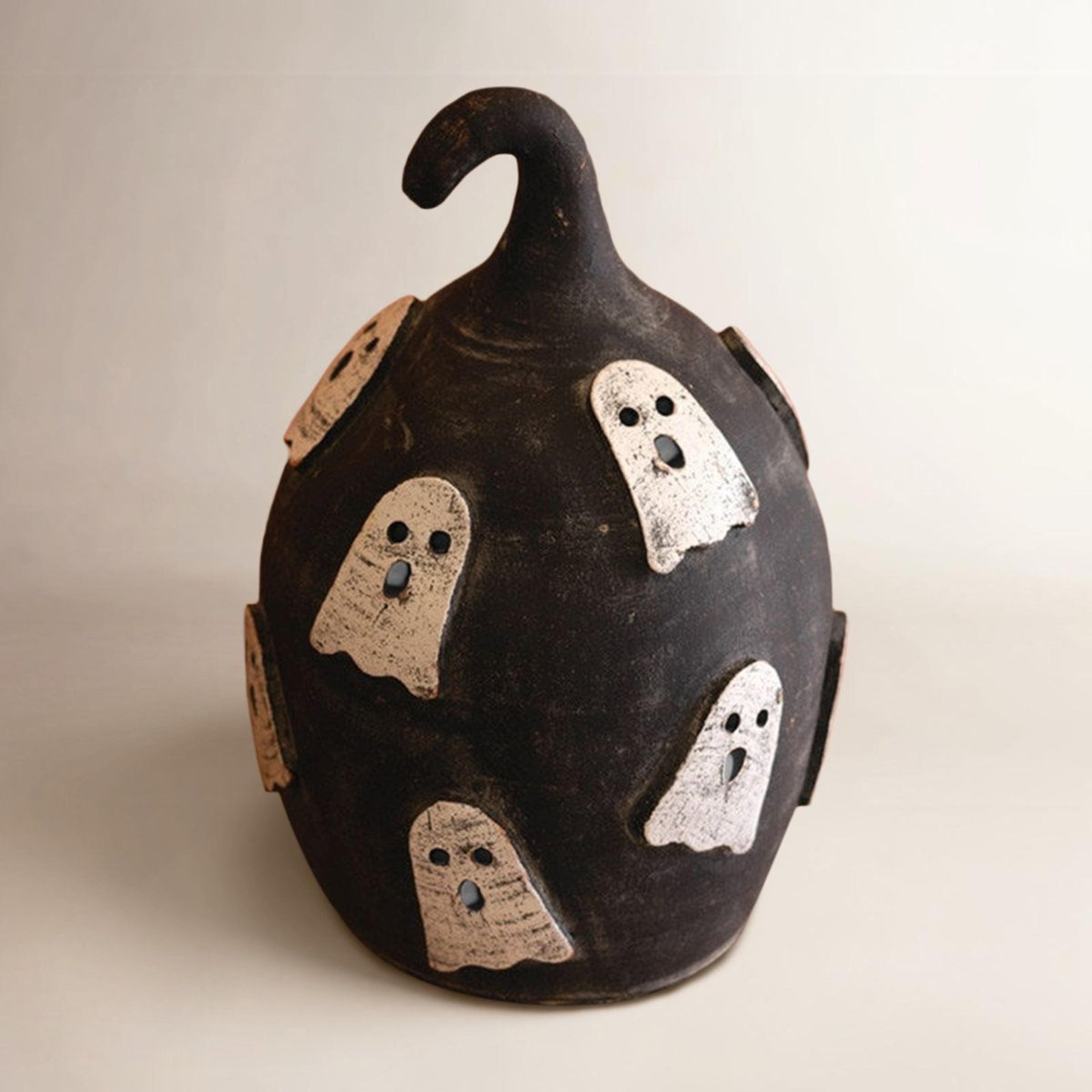 handcrafted black clay pumpkin luminary with ghost cutouts halloween decor 14 inch
