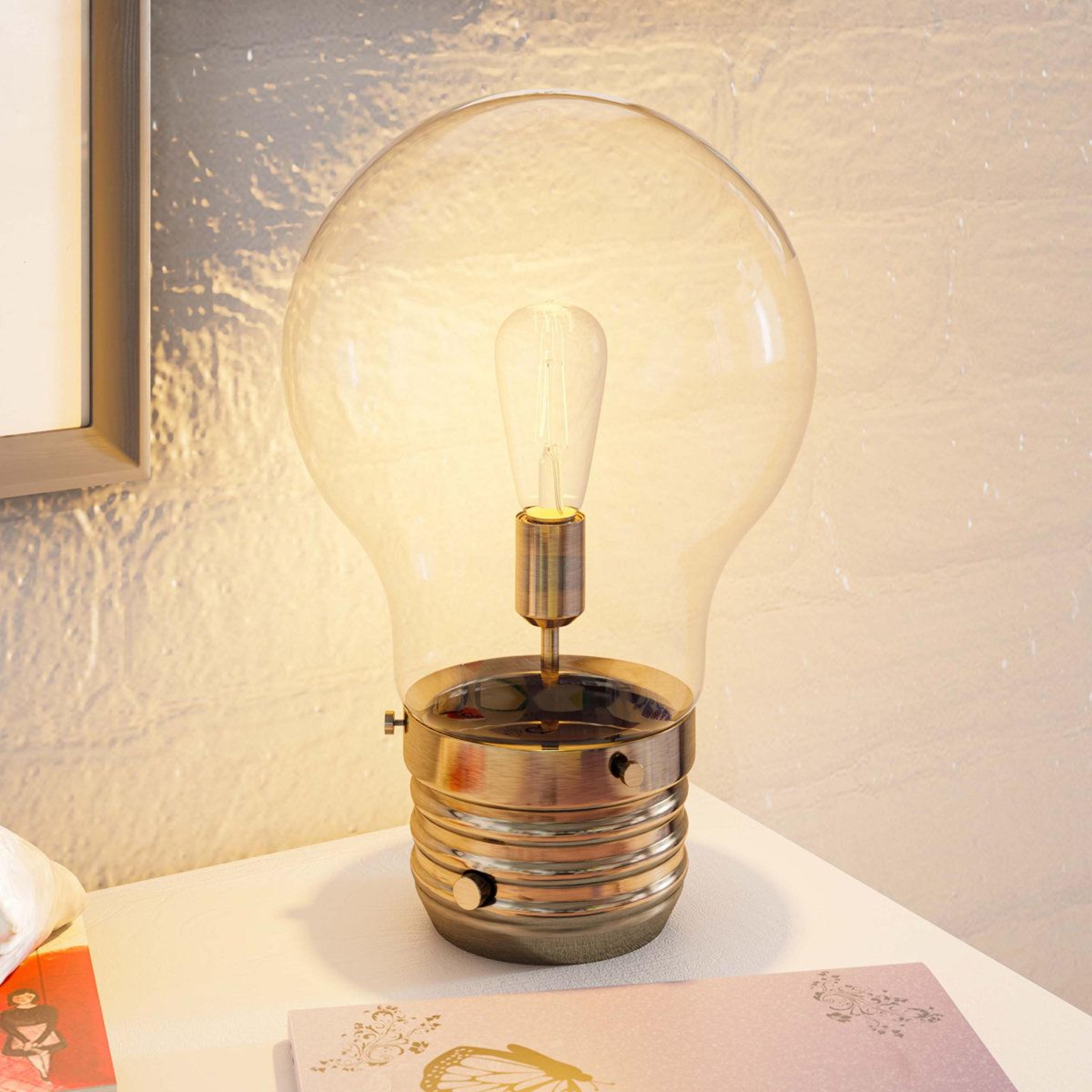 edison table lamp with clear glass shade and antique brass metal base