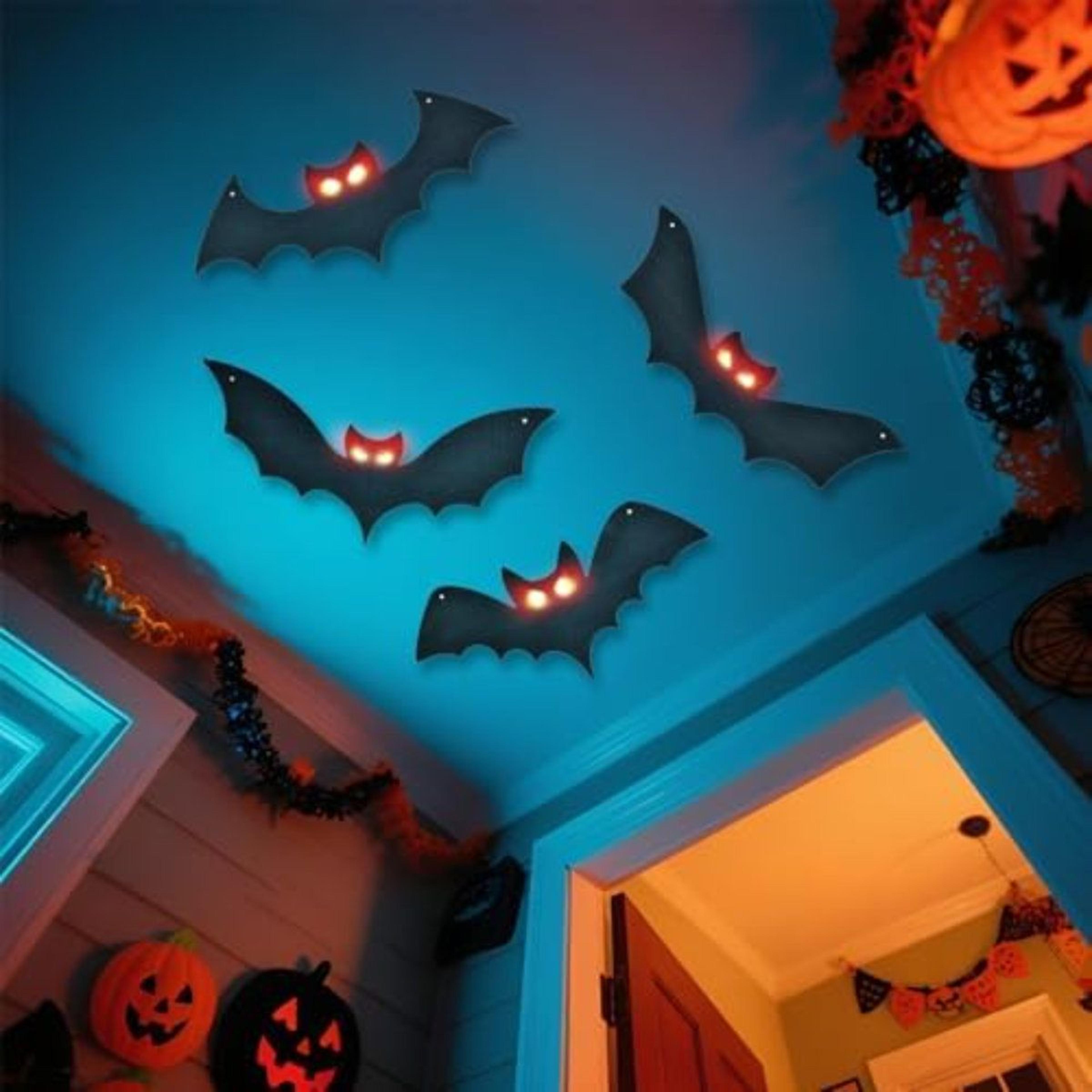 lighted halloween hanging bats with red led eyes – 4-piece outdoor decoration set