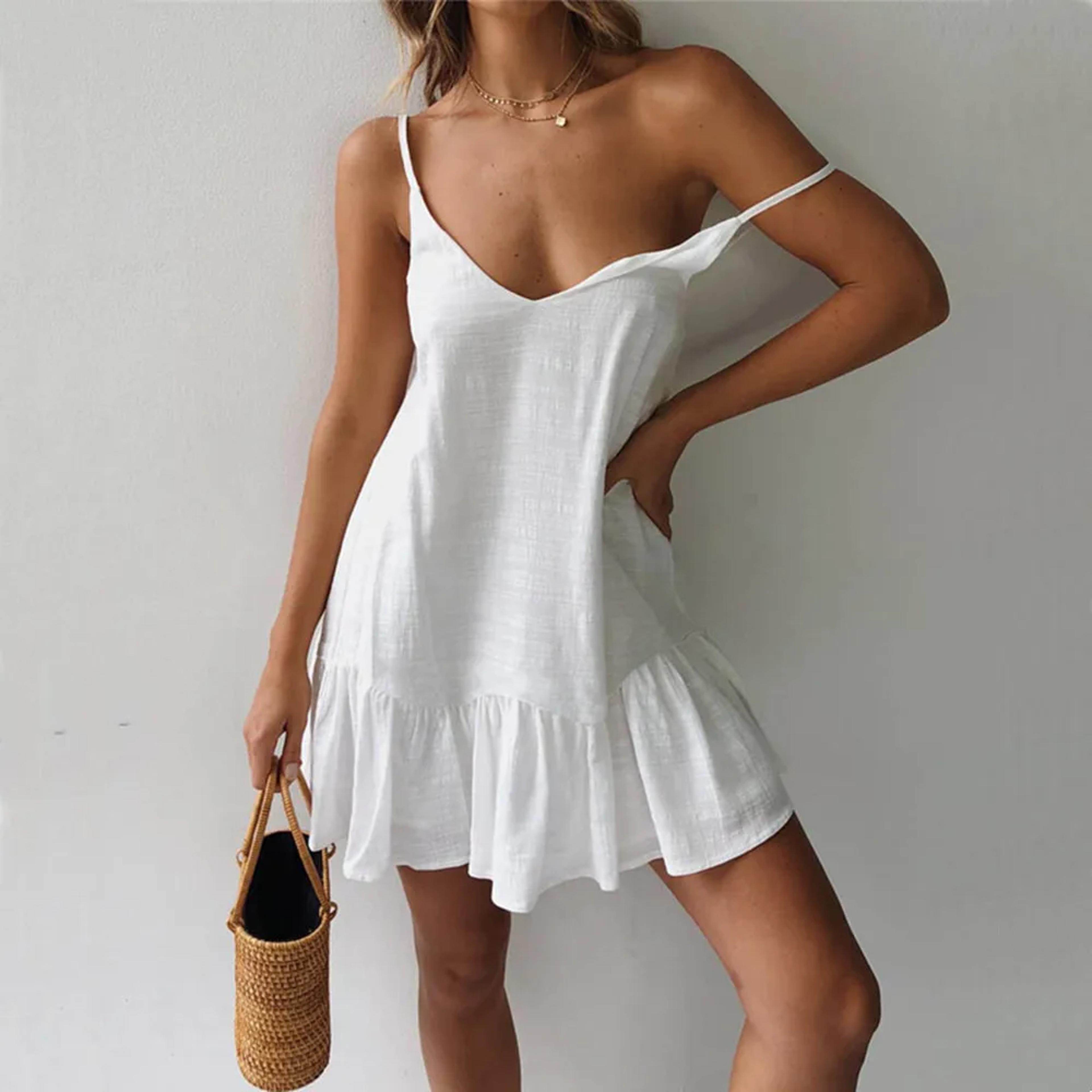 cotton linen mini dress with ruffles and spaghetti straps for effortless summer style