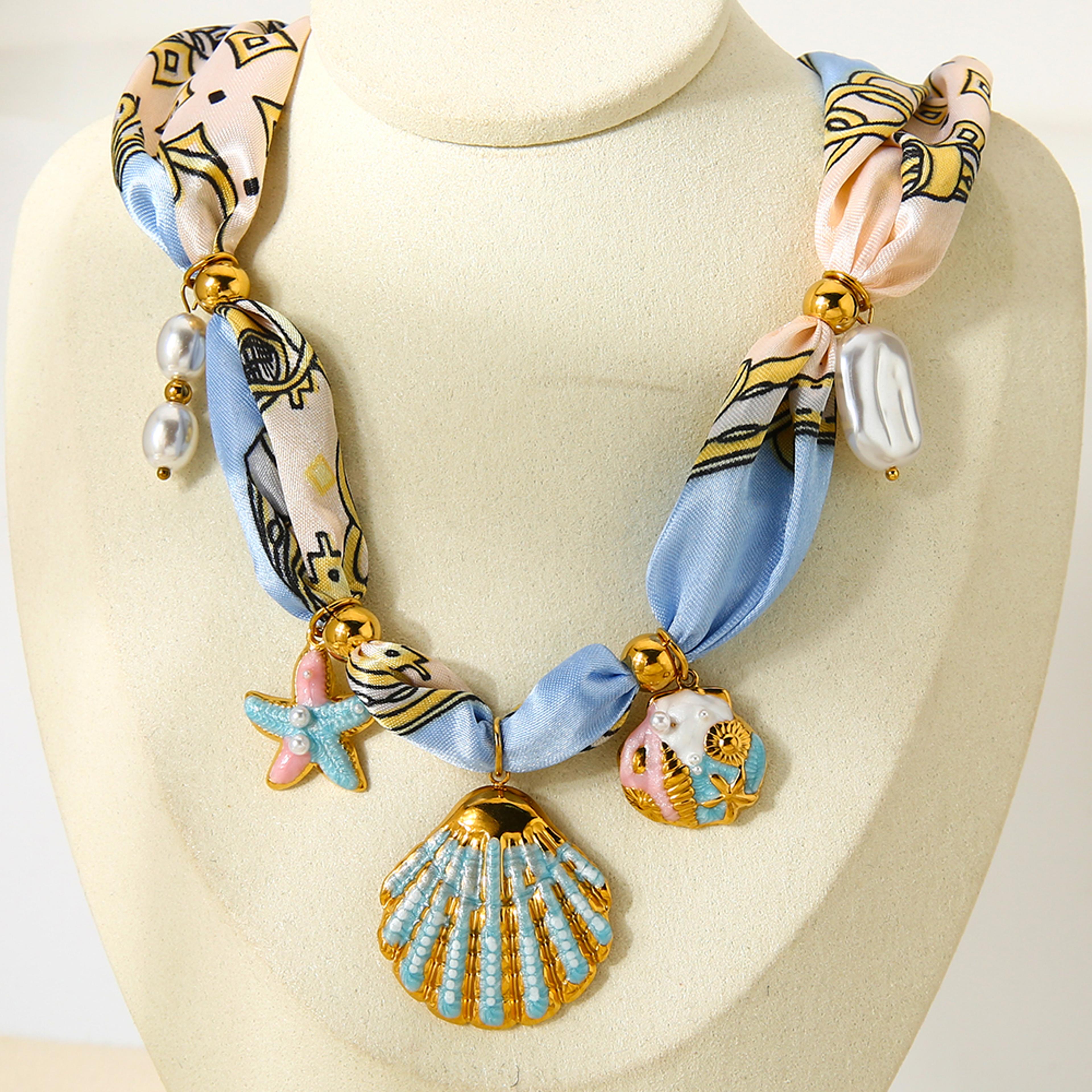 gold starfish necklace with shell pendant and stainless steel chain