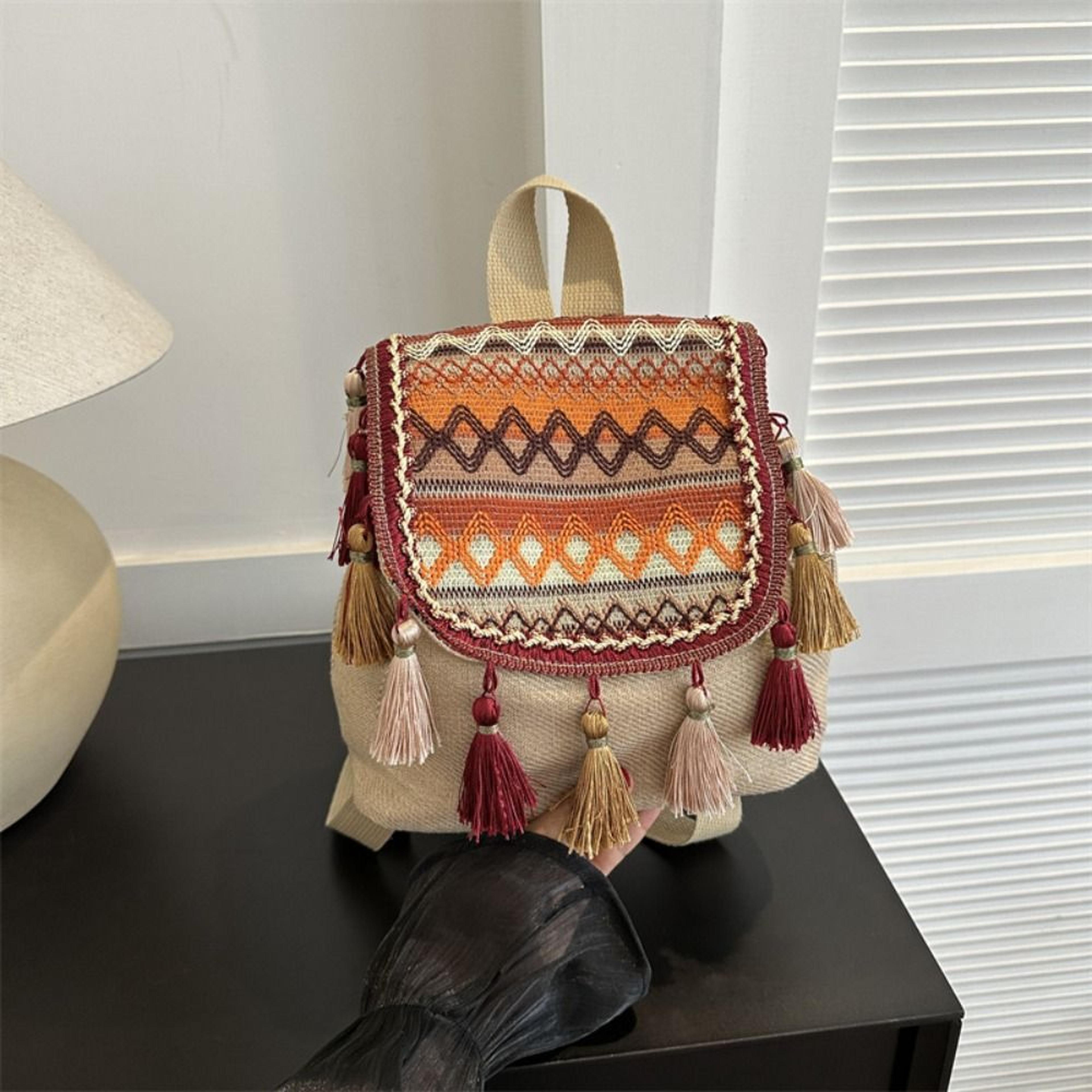 ethnic embroidered canvas backpack and boho tassel shoulder bag