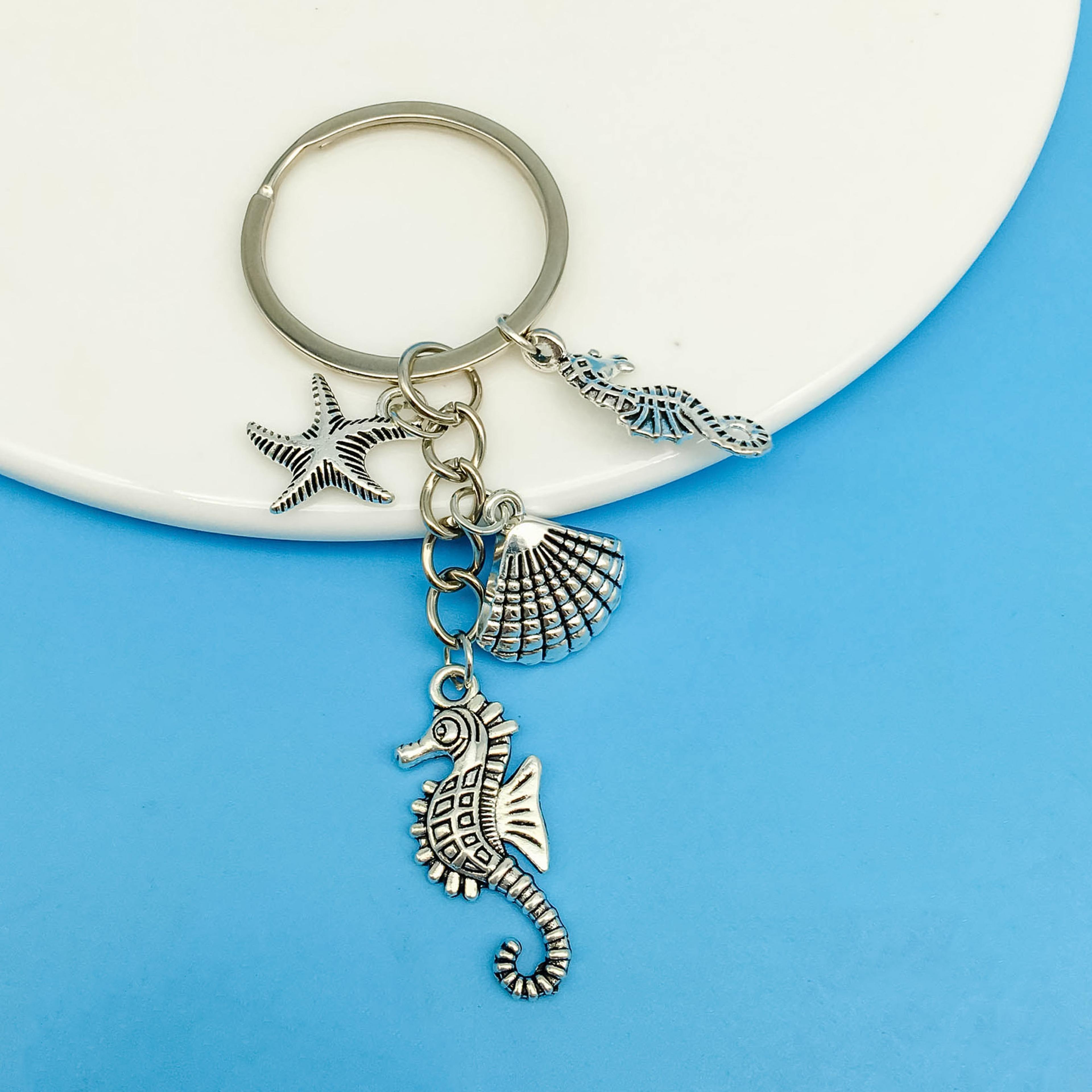 sea life keychain with starfish and seahorse charms, the ultimate ocean themed gift