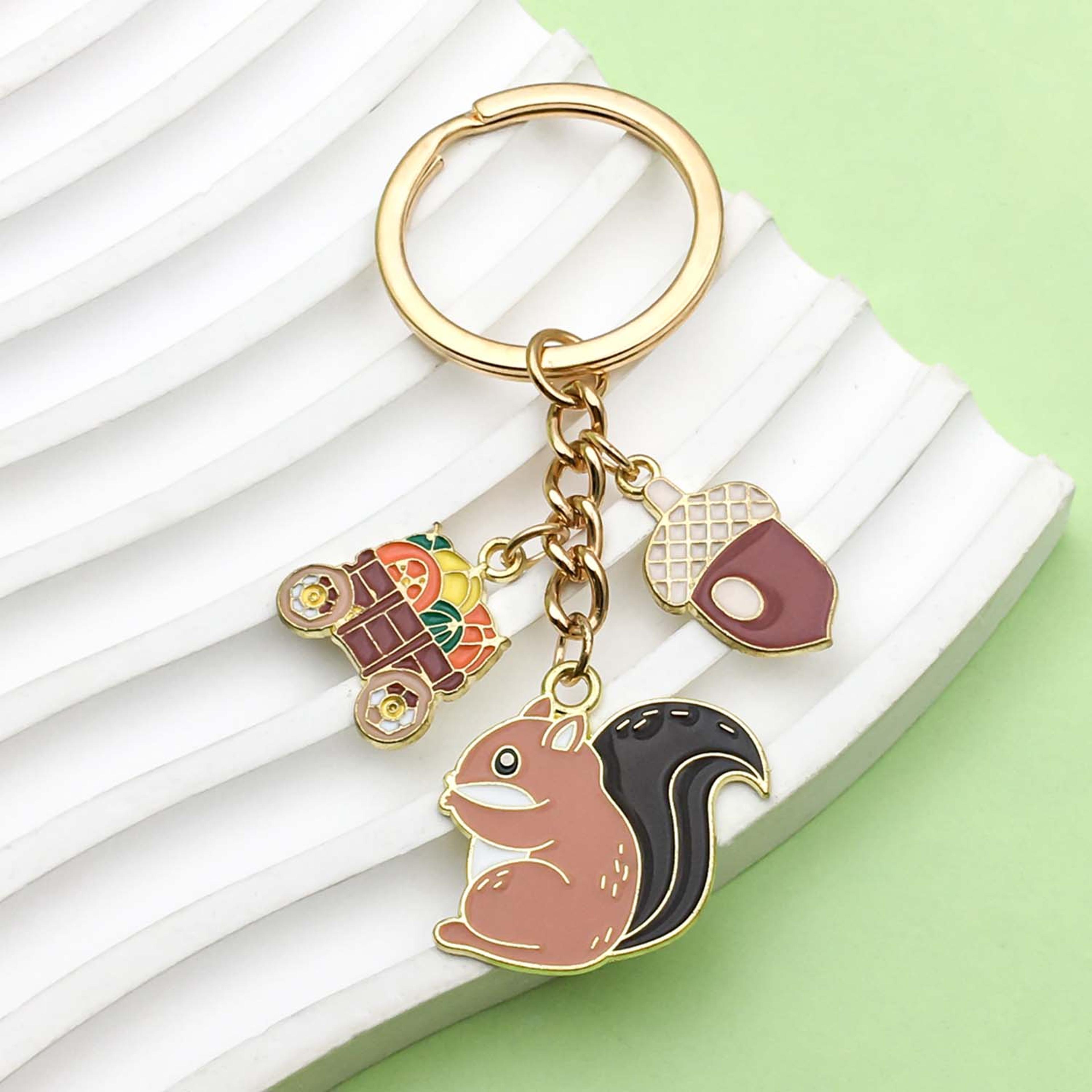 adorable cute squirrel keychain with pine cone design for car keys and backpacks