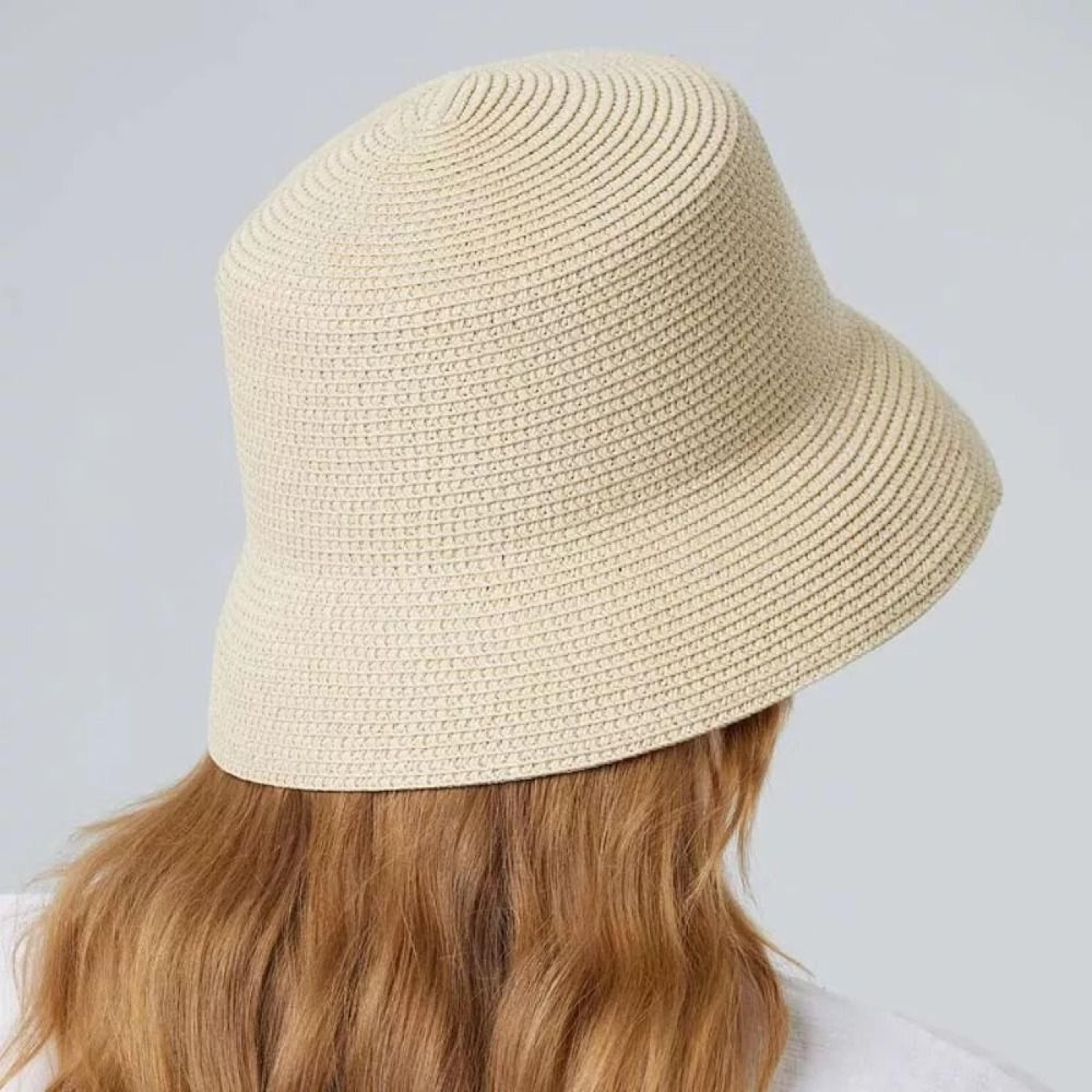 women straw bucket hat for summer travel and sun protection
