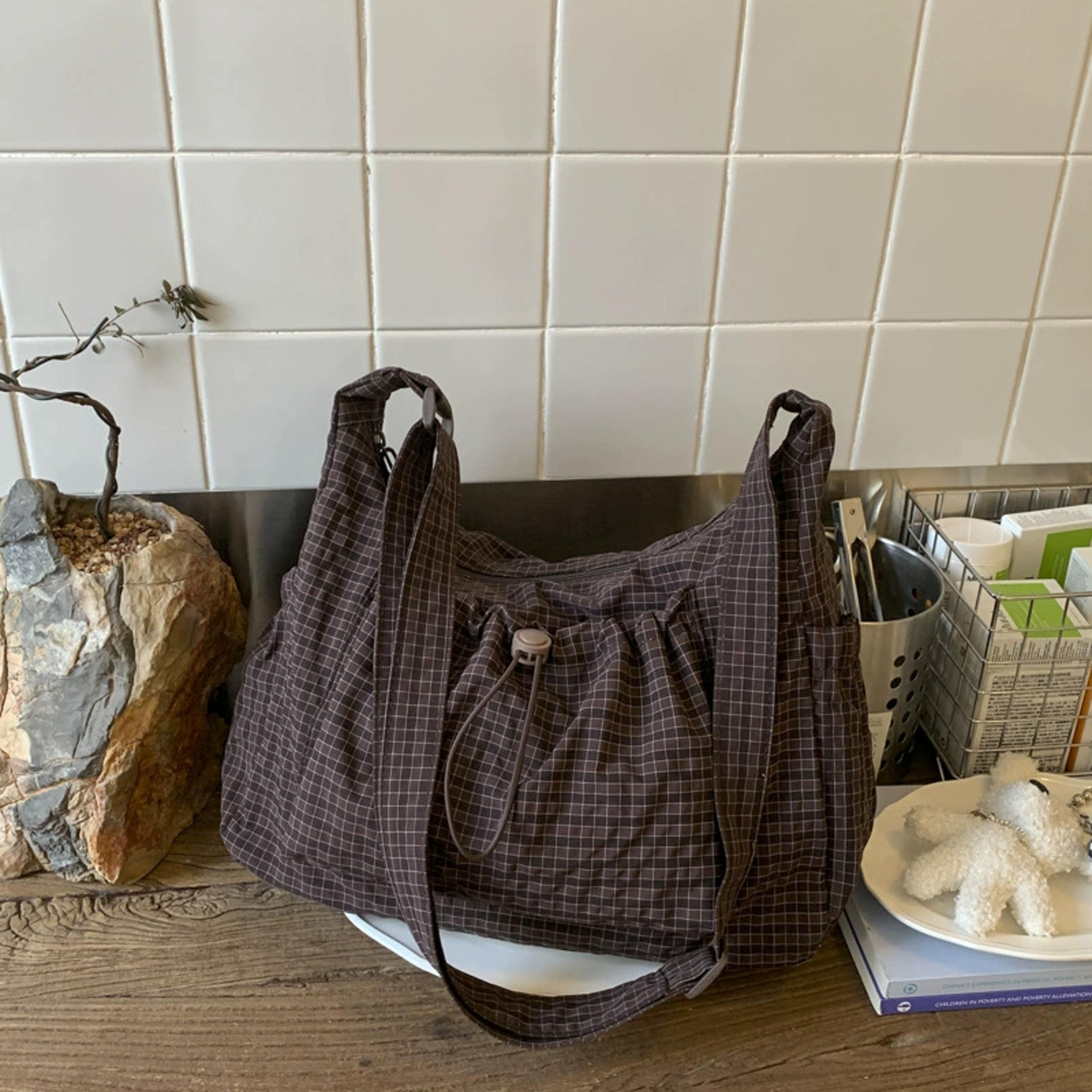 plisse cloud tote and nylon shoulder bag for everyday commuters