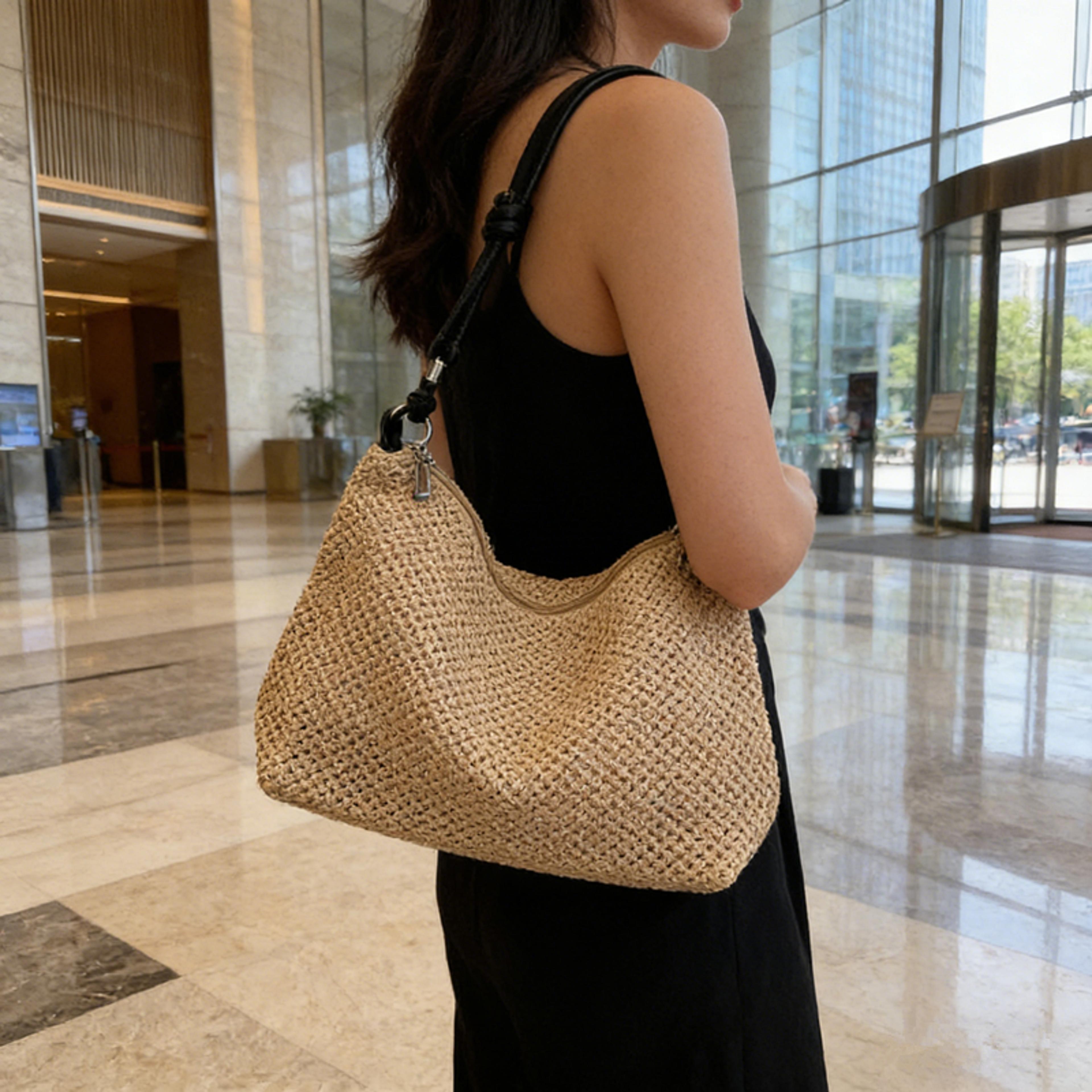 chic straw woven shoulder bag with knotted leather handles and crossbody strap