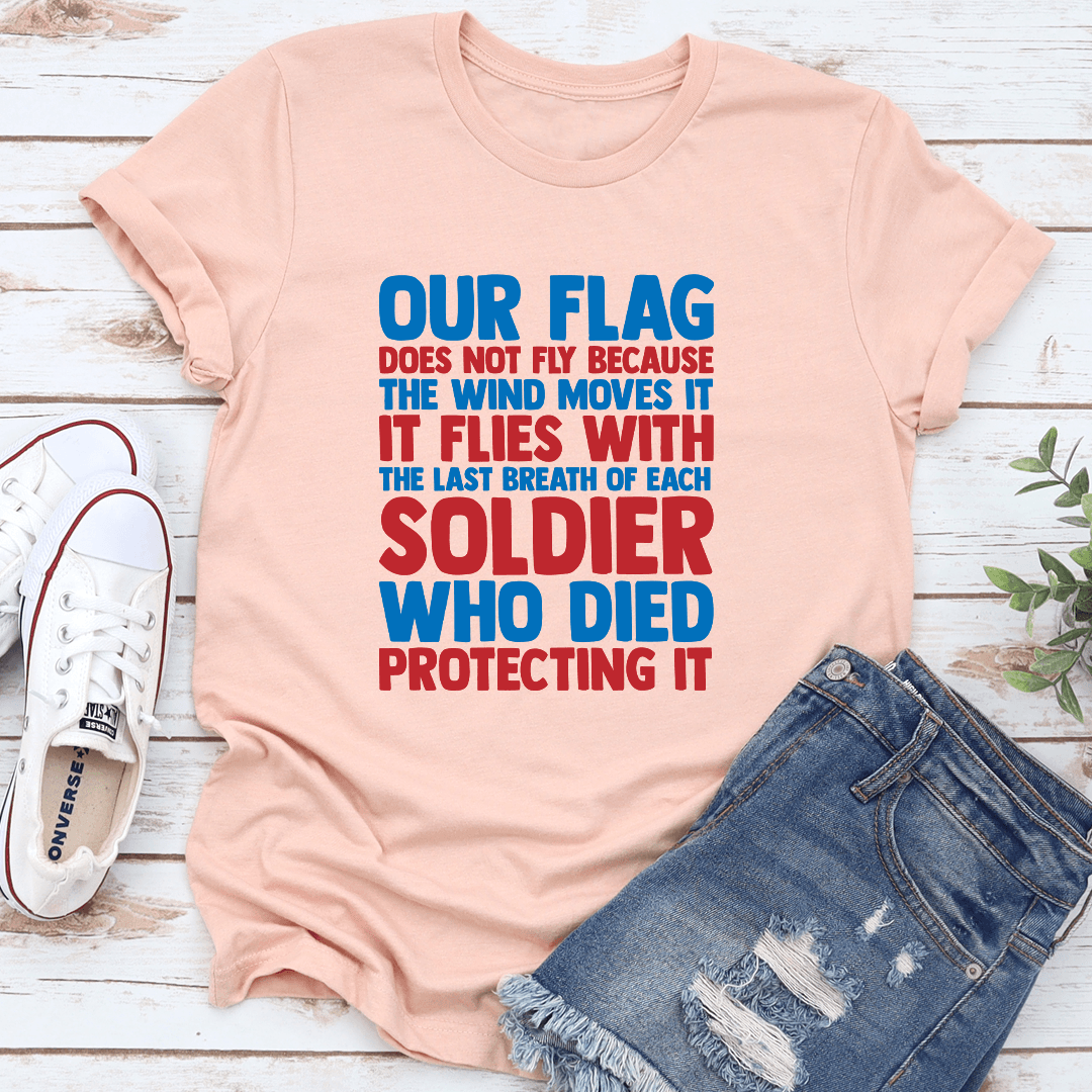 our flag does not fly tee