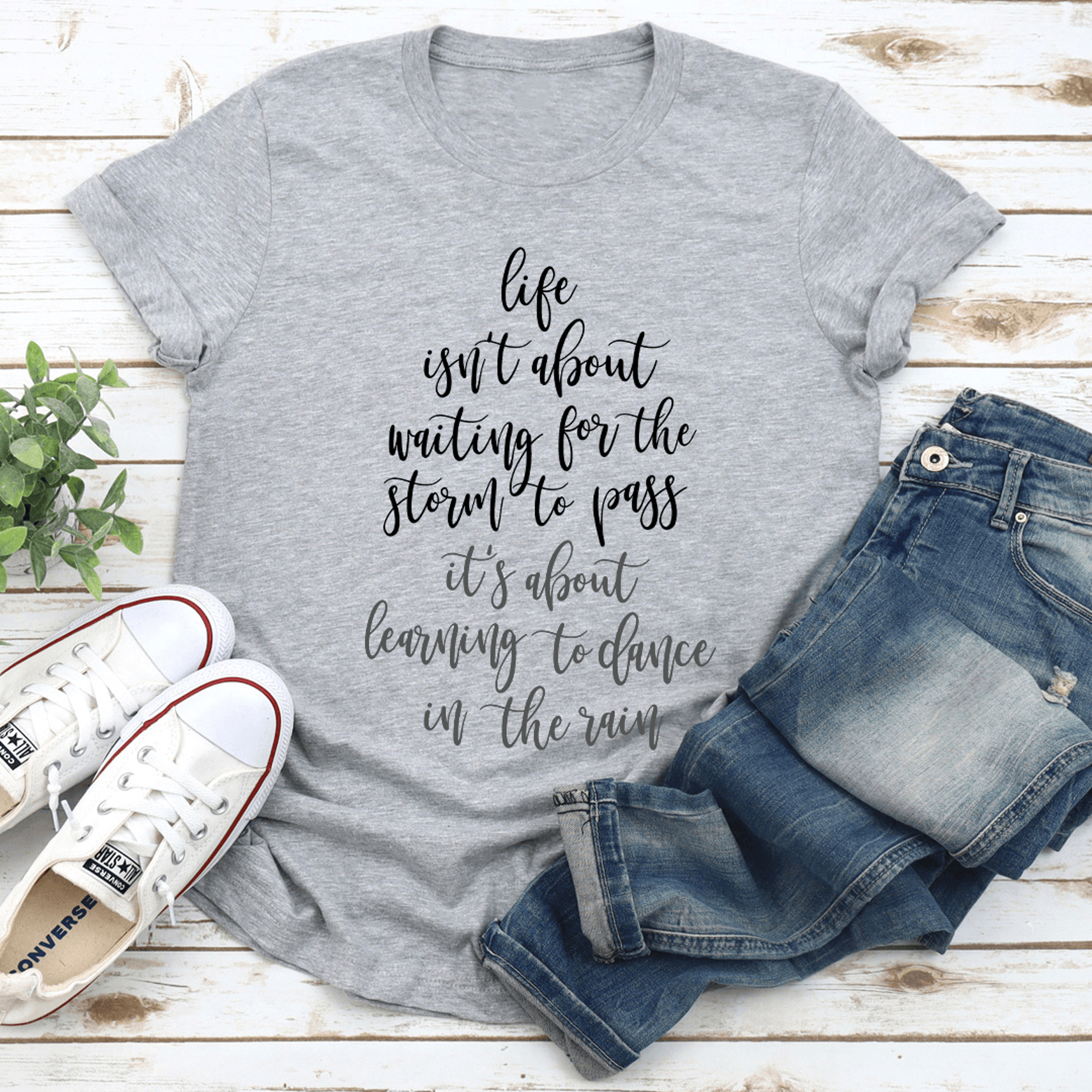 liife isn't about waiting for the storm to pass tee