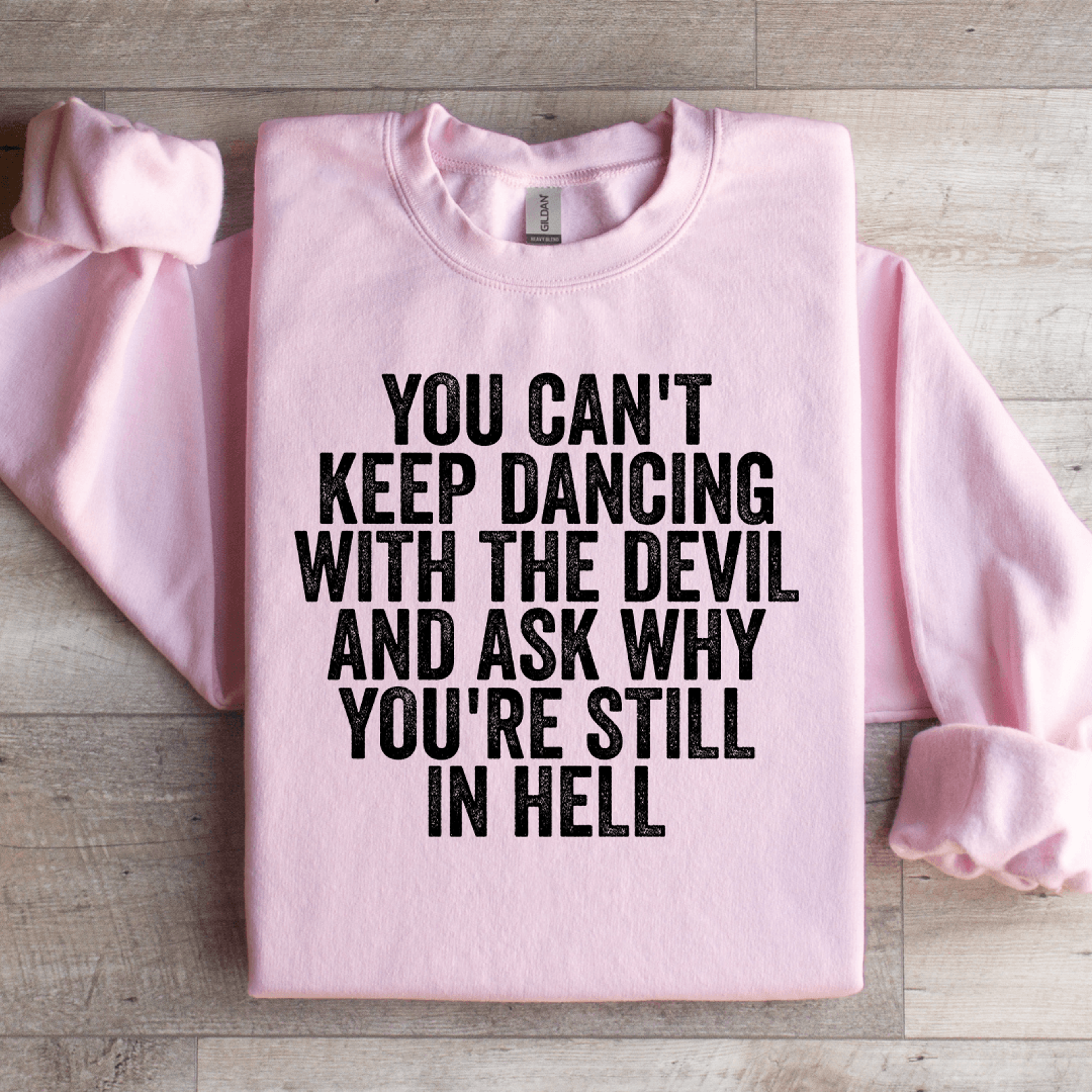 you can't keep dancing with the devil sweatshirt