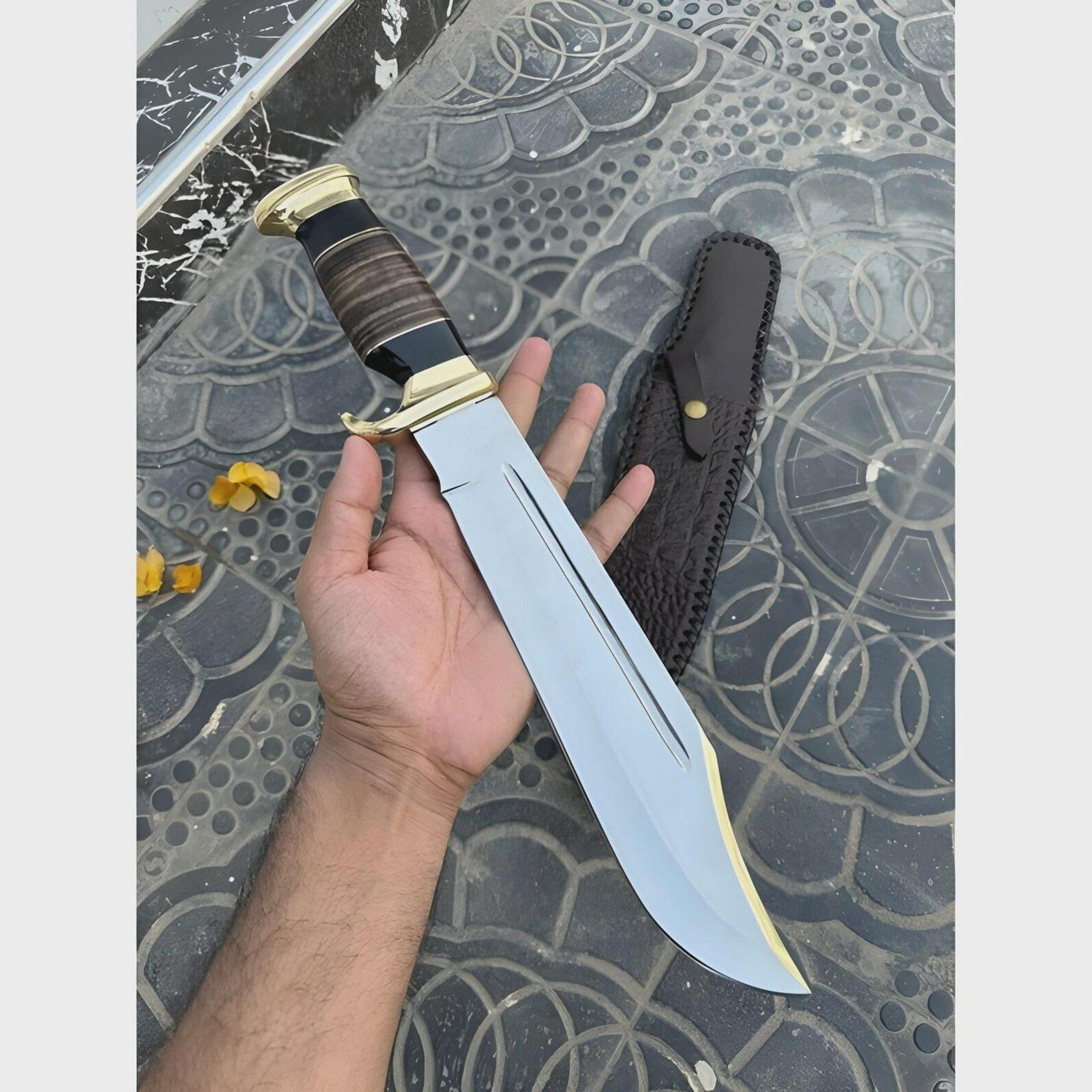 handcrafted j2 steel bowie knife with leather wrap and brass guard - perfect for outdoor enthusiasts and collectors