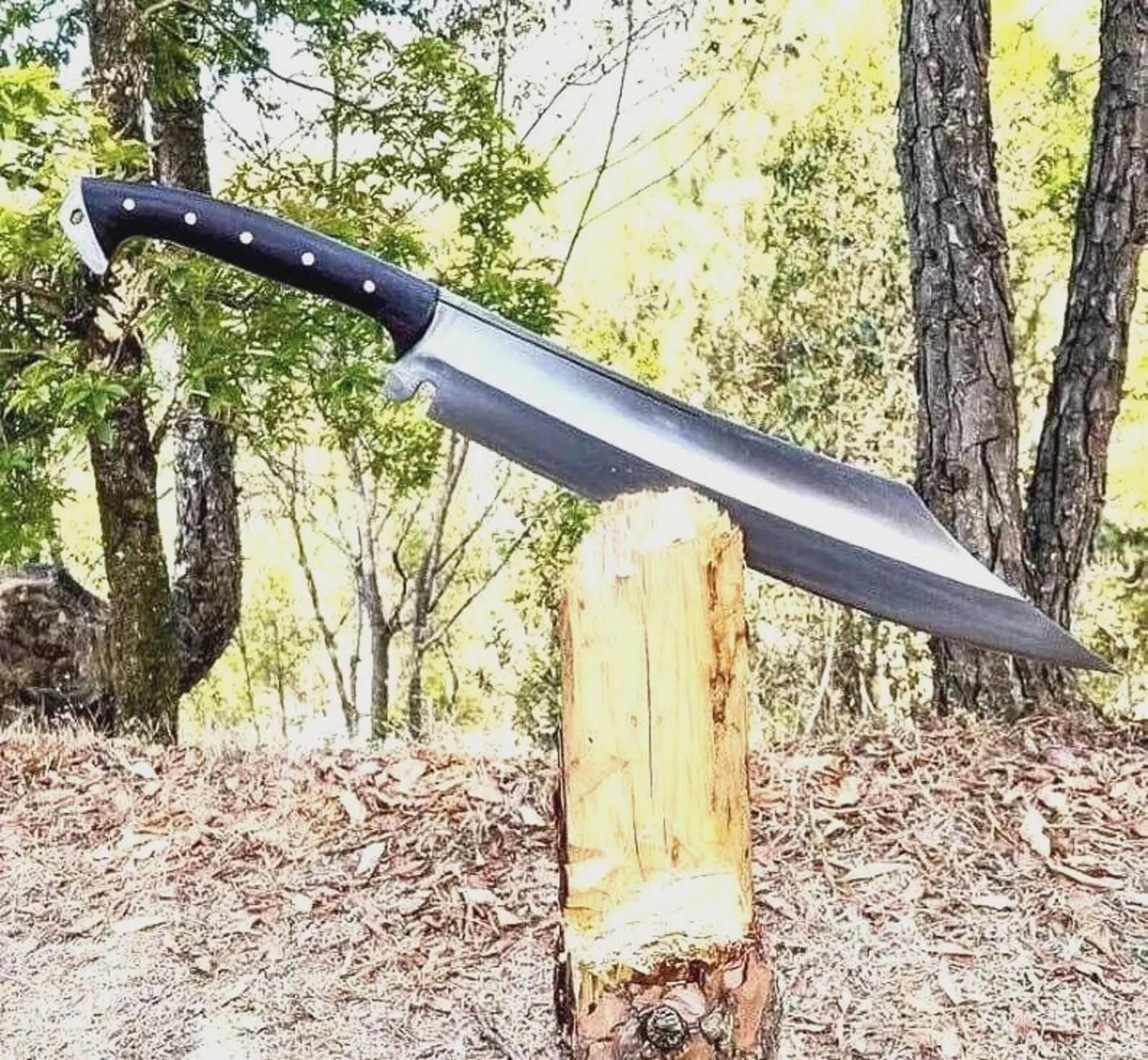 handcrafted viking-style machete with 18-inch carbon steel blade and rosewood handle for outdoor enthusiasts