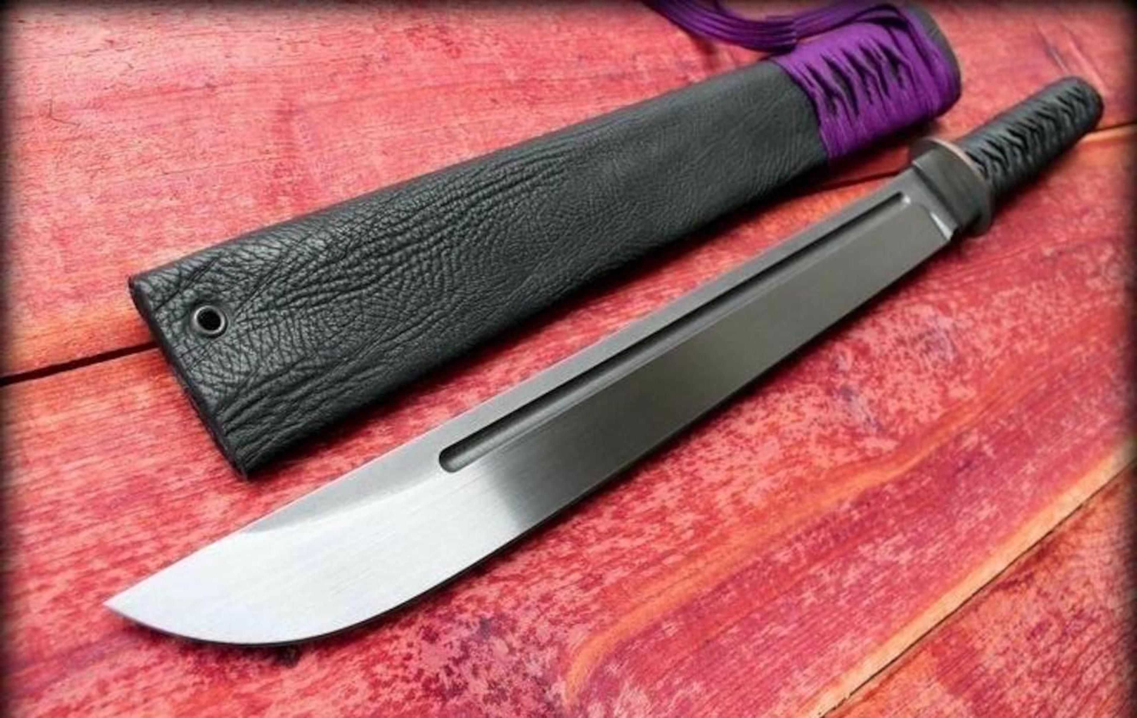 handcrafted long blade machete with minimalist steel design for outdoor bushcraft and utility tasks