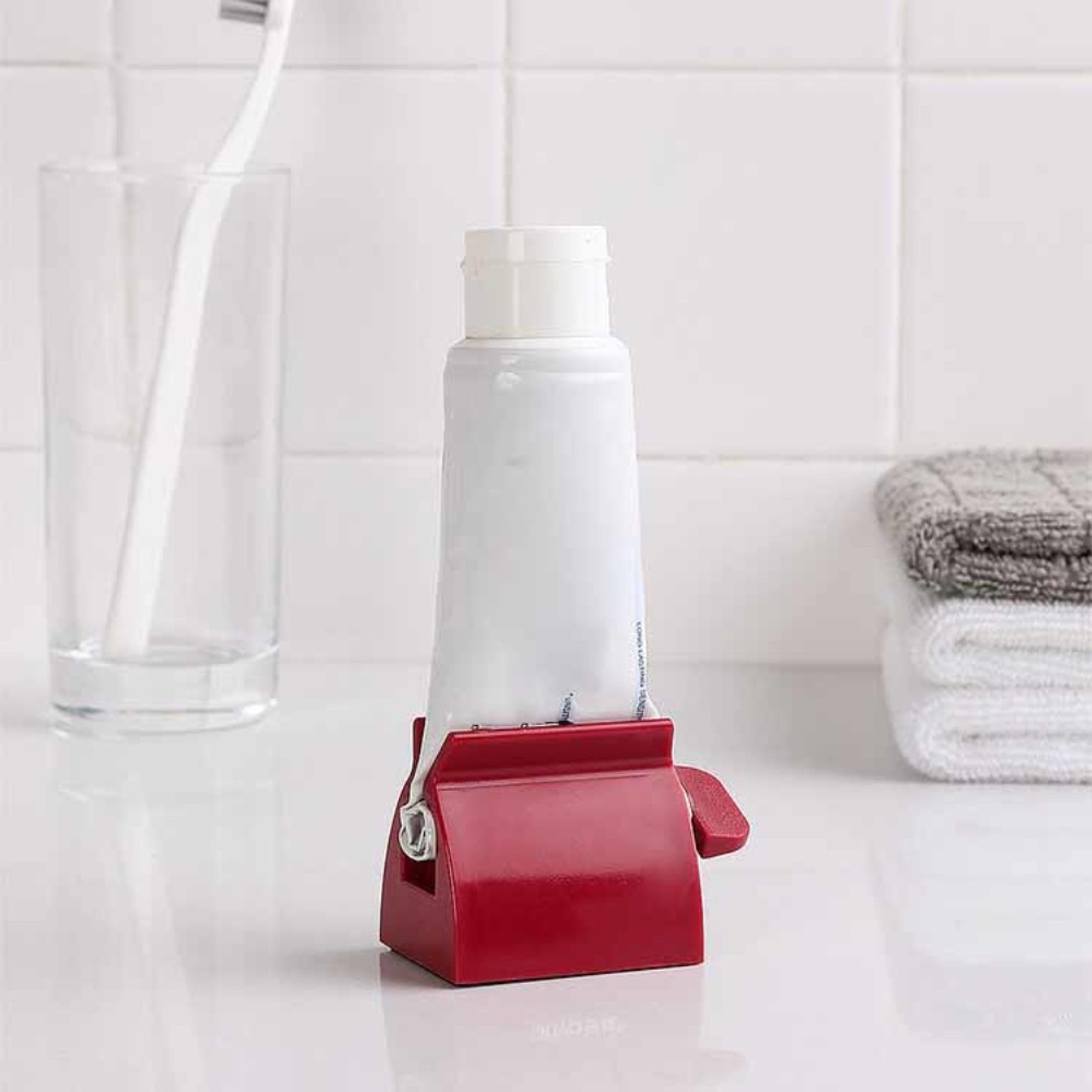 plastic rolling tube toothpaste squeezer | rolling tube squeezer toothpaste holder | rotate toothpaste dispenser