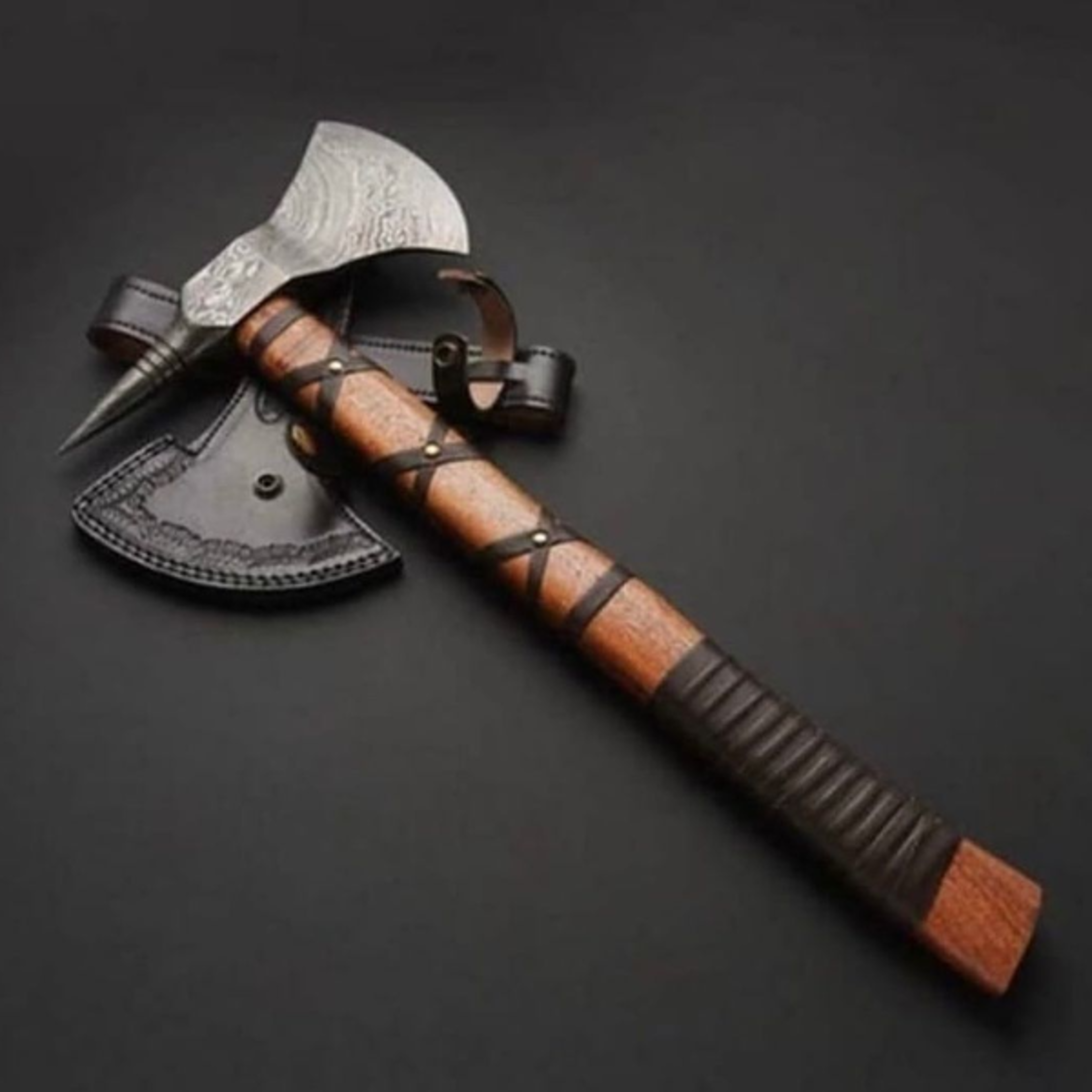 custom handmade damascus blade throwing axe with ash wod handel leather wrapping
