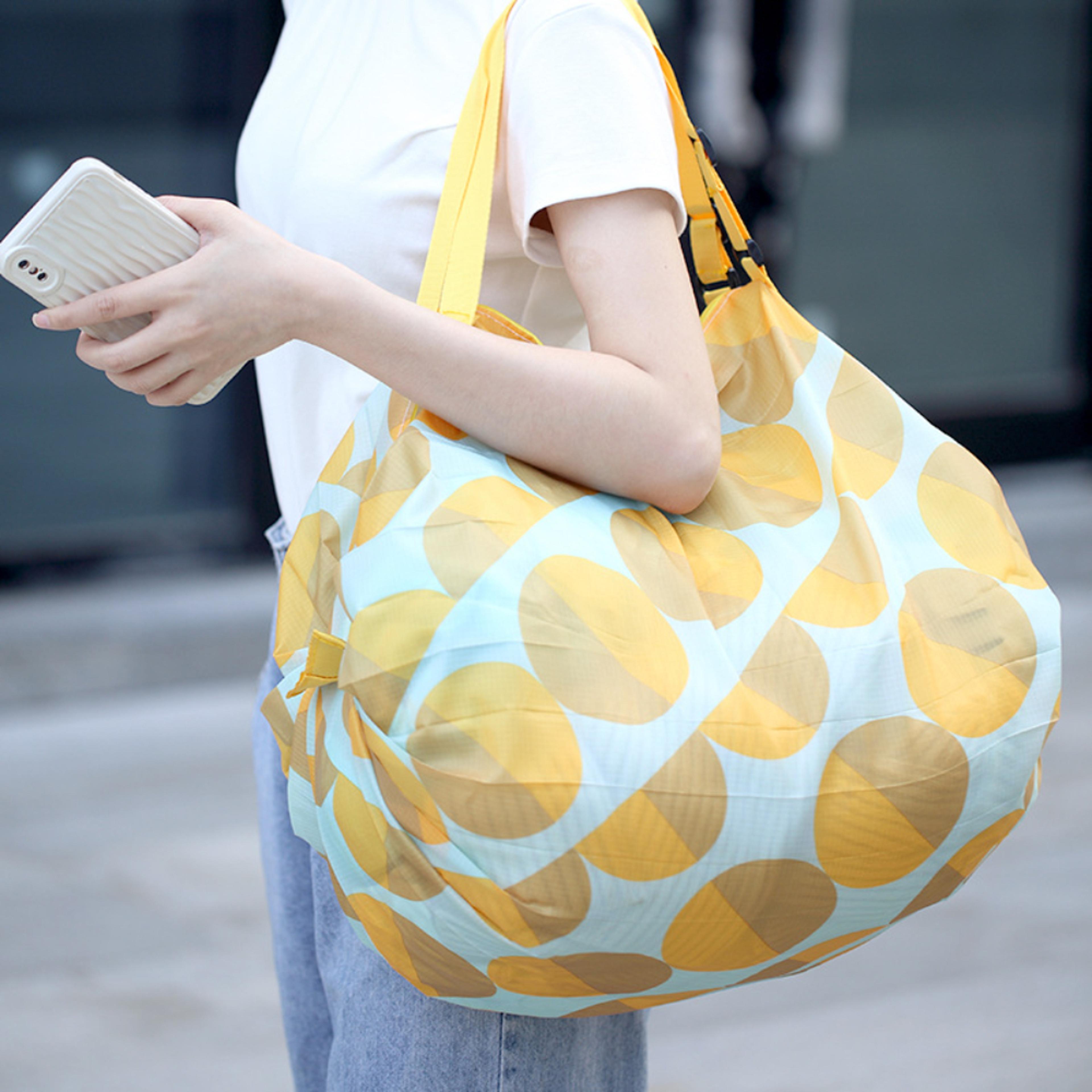 portable folding shopping bag with large capacity ideal for accordion storage and supermarket shopping