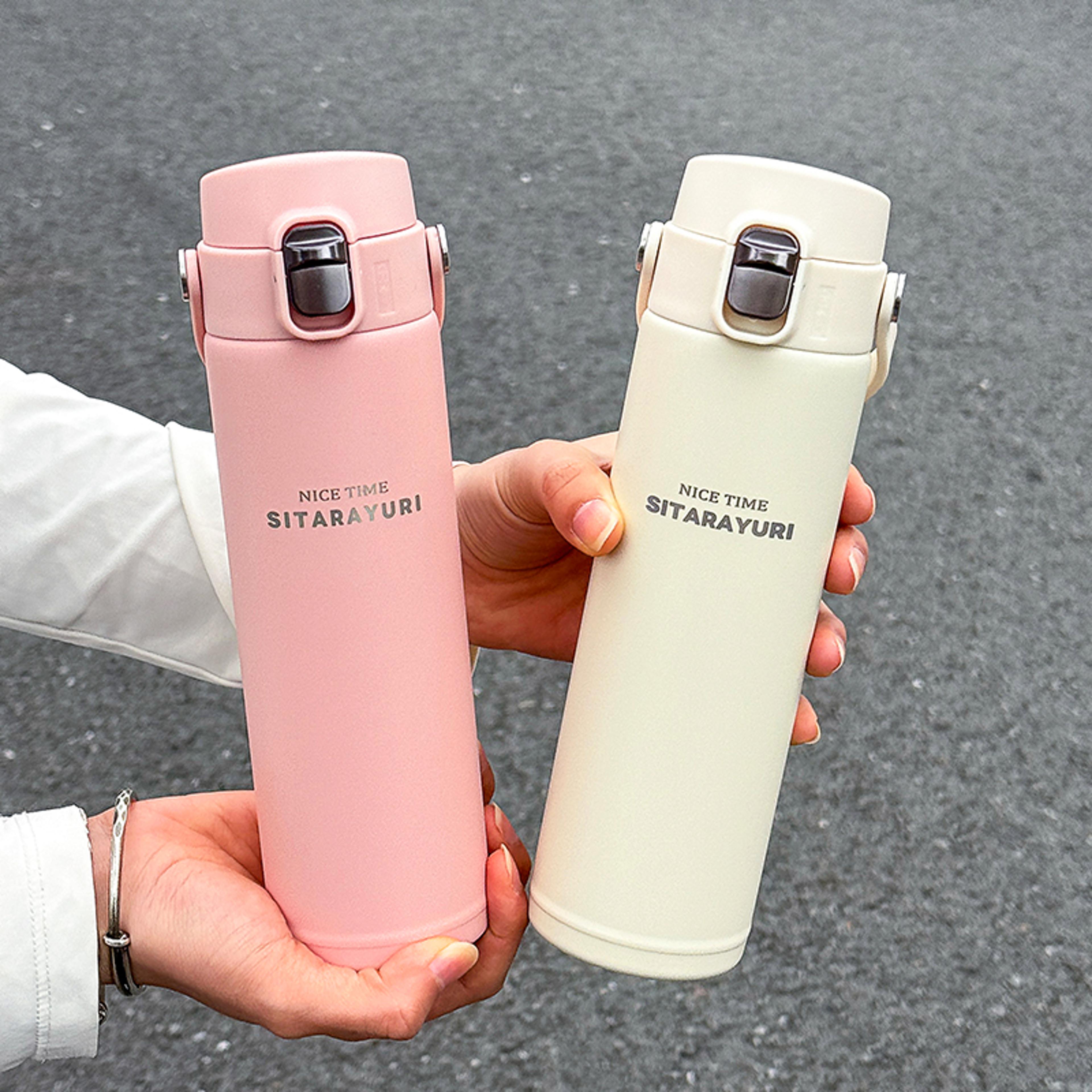stainless steel insulated sports bottle with pop up direct drink feature and wide handle for outdoor activities