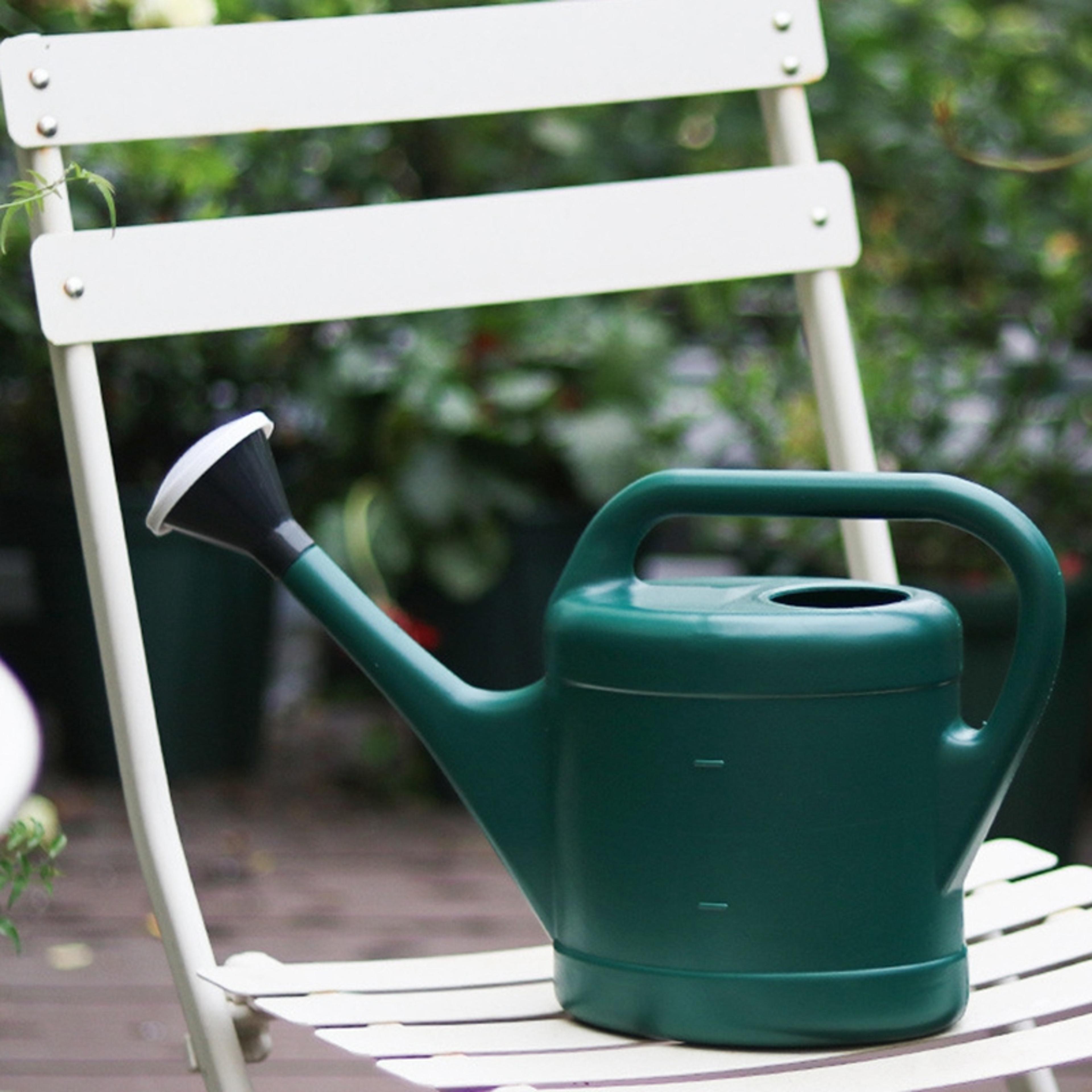 plastic gardening watering can with long nozzle perfect for balcony and vegetable plants