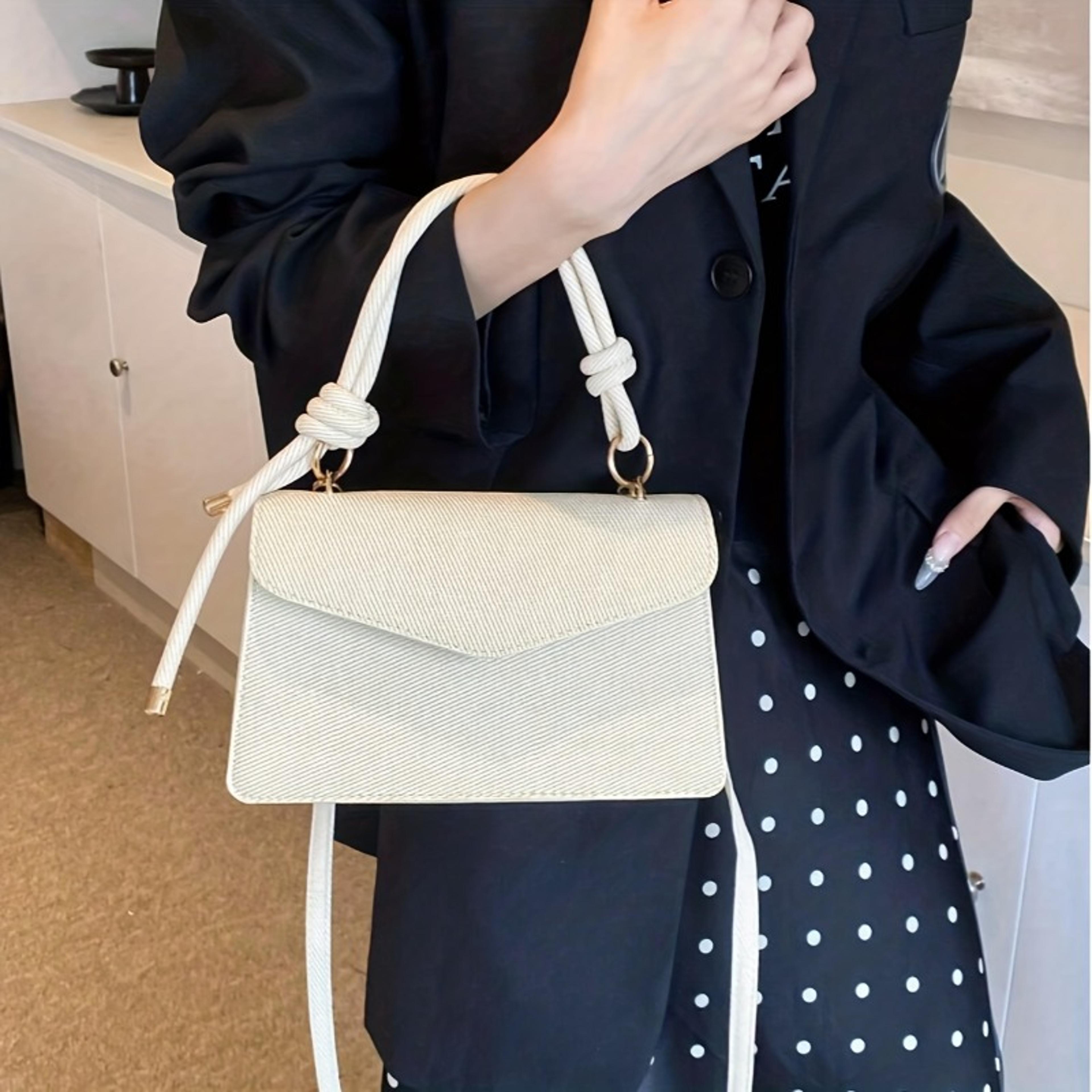 minimalist canvas crossbody tote bag with knotted rope detail