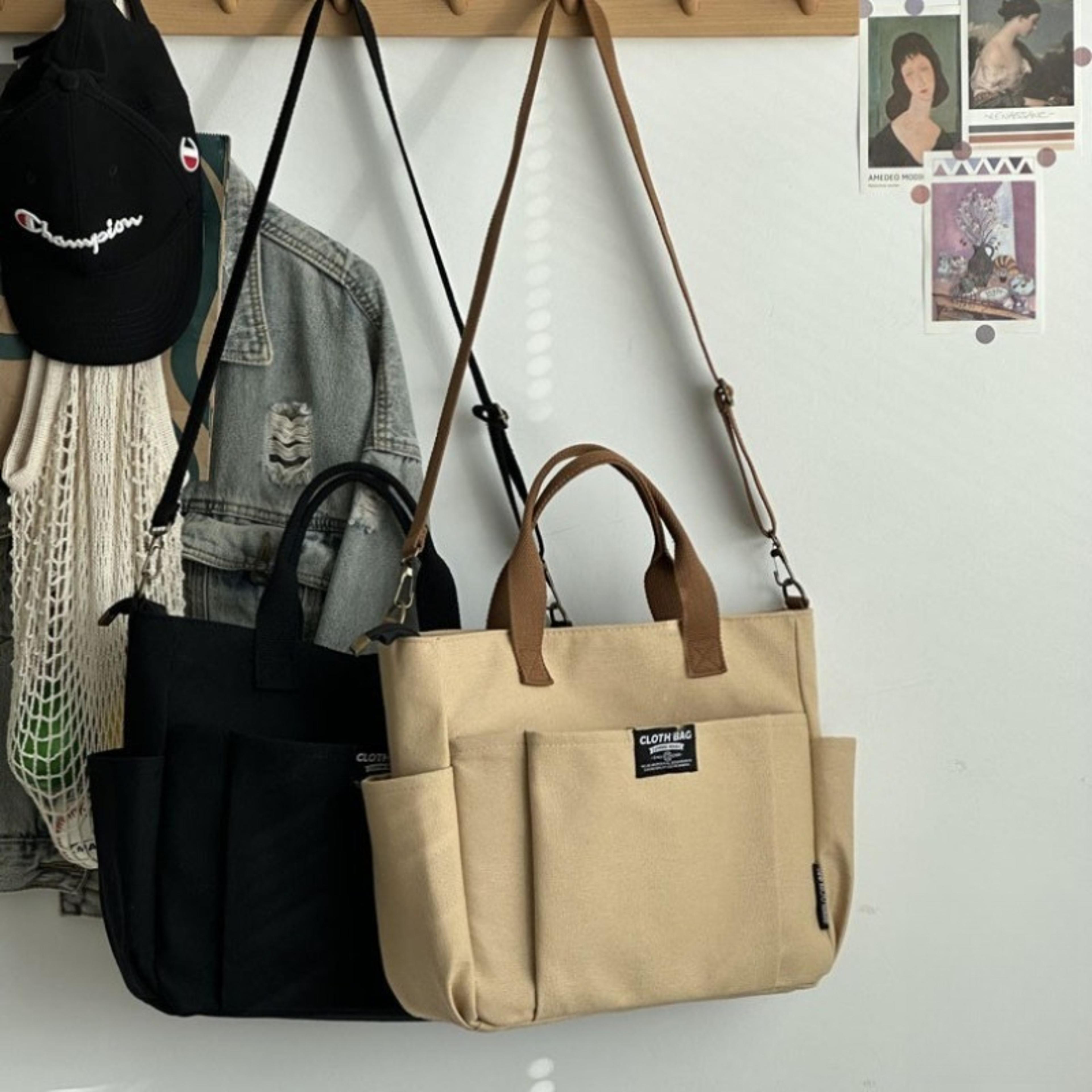 large capacity canvas tote bag with multi pocket crossbody design