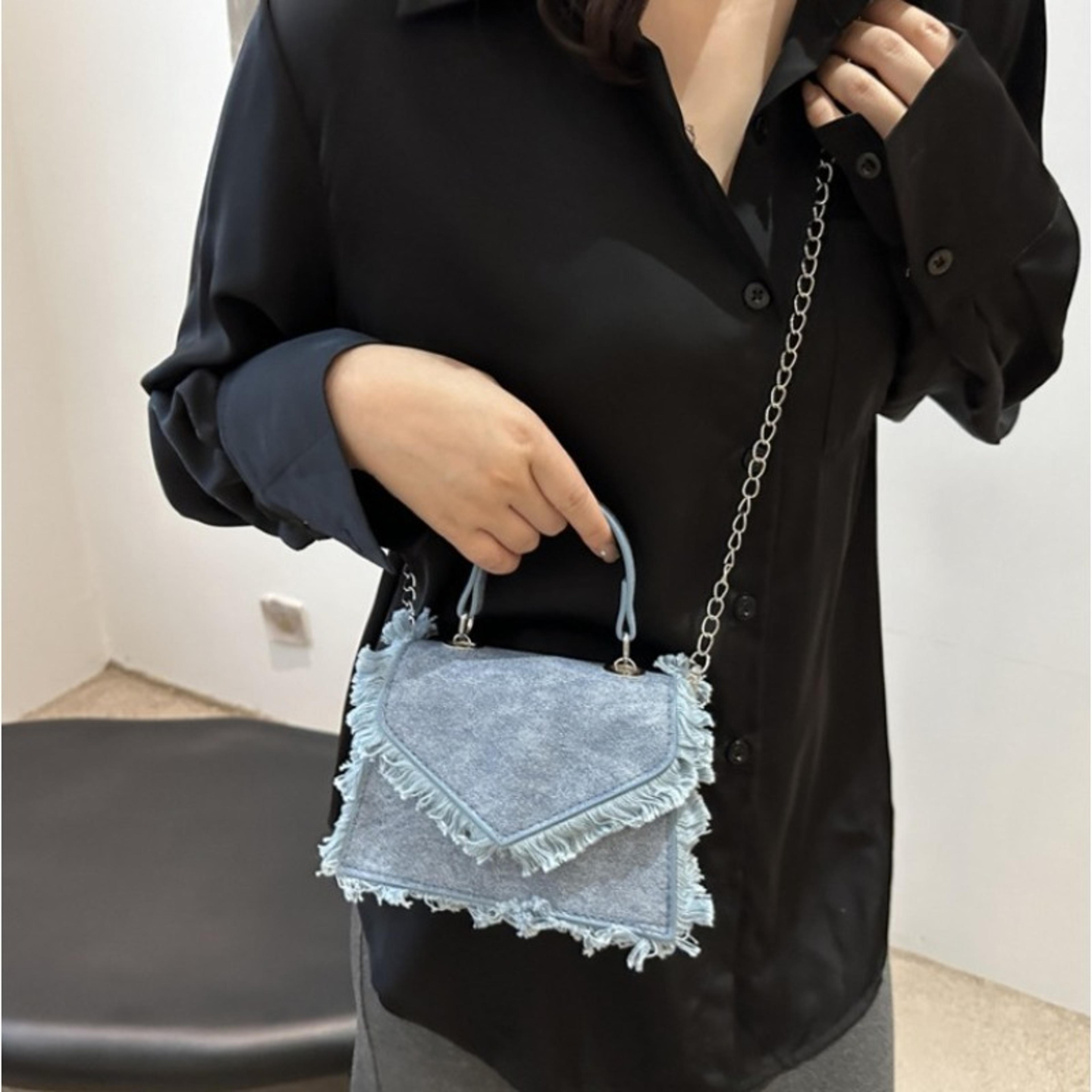 frayed edge envelope crossbody bag for women with chain strap and top handle