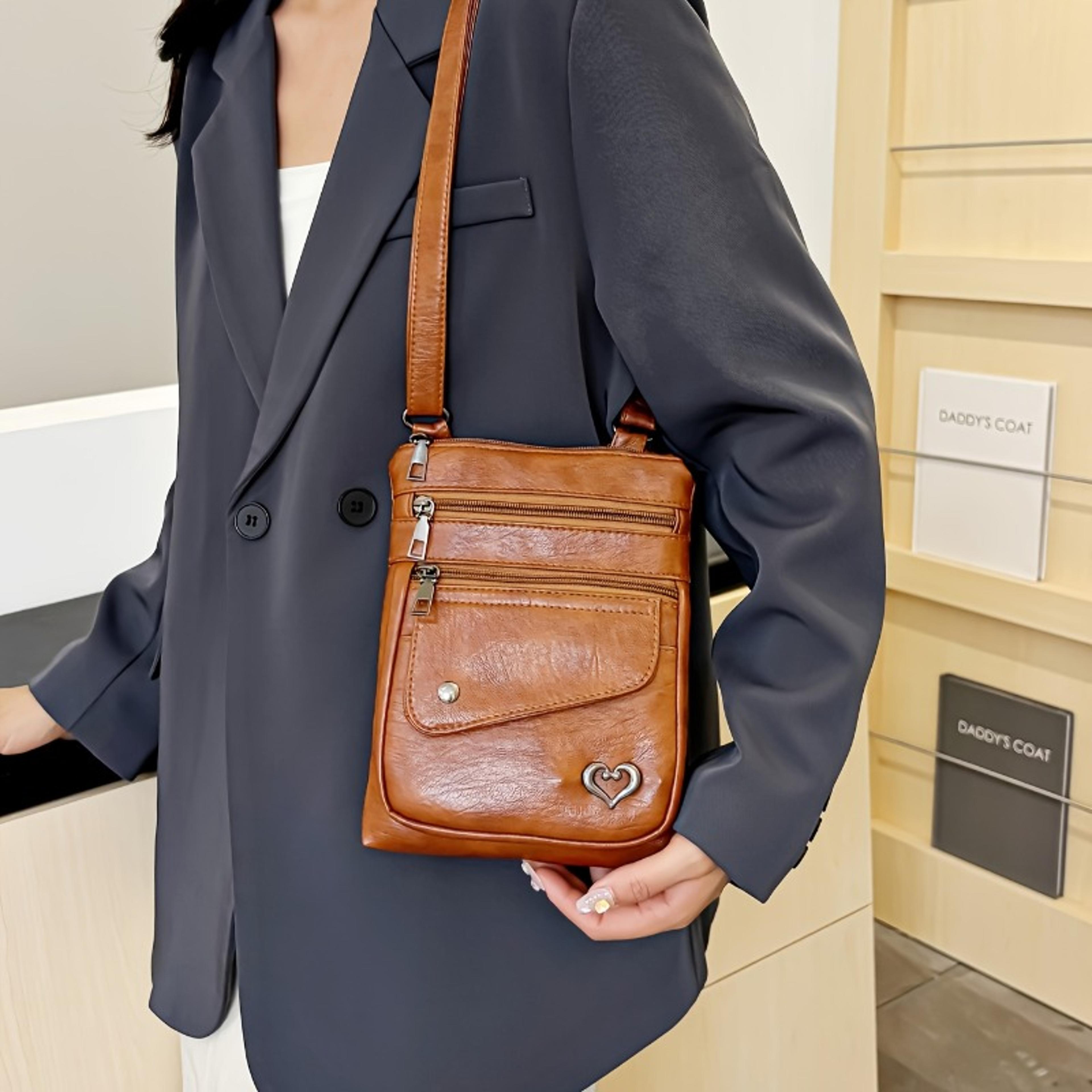 vintage multi pocket crossbody bag for women with heart accent