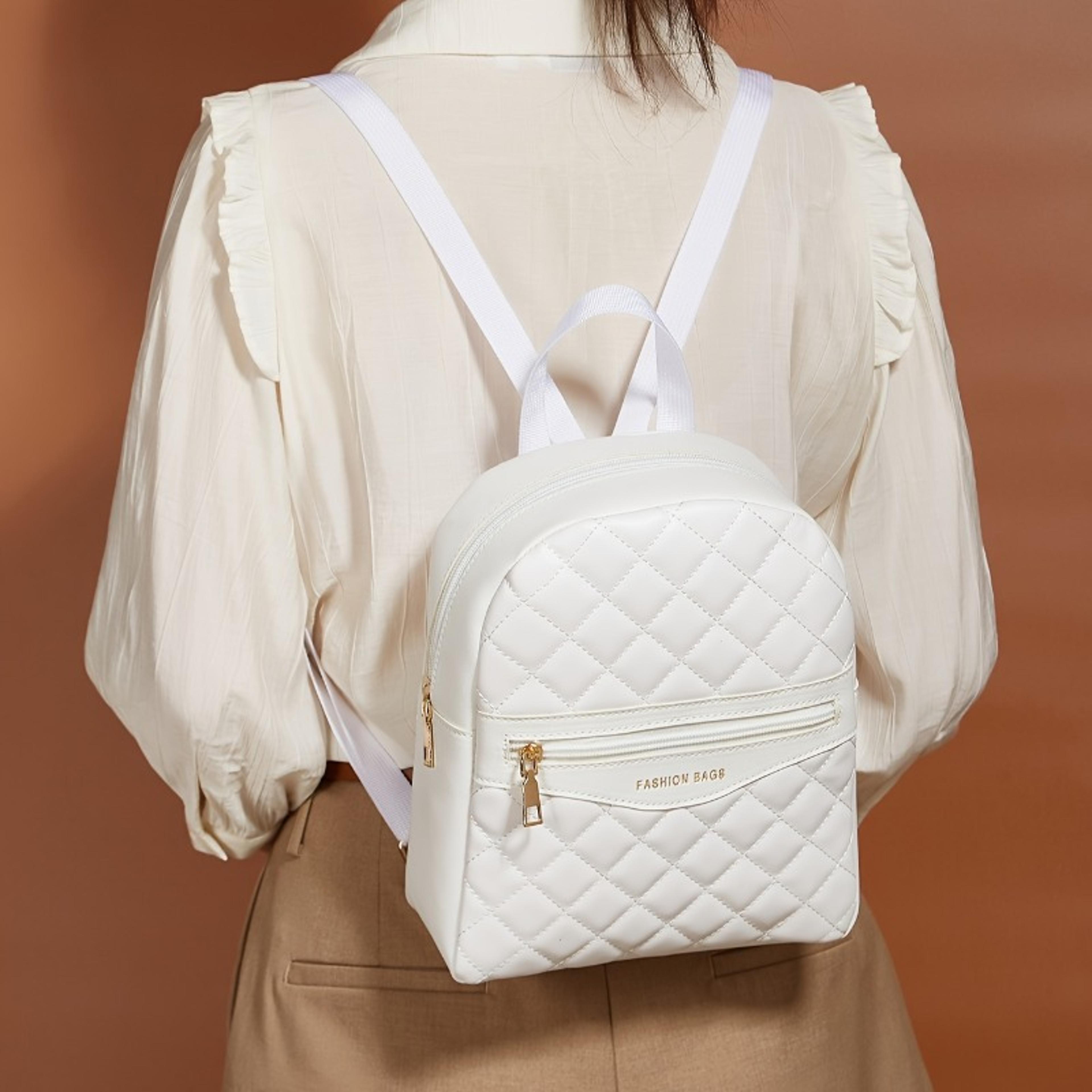chic white quilted womens mini backpack with gold hardware