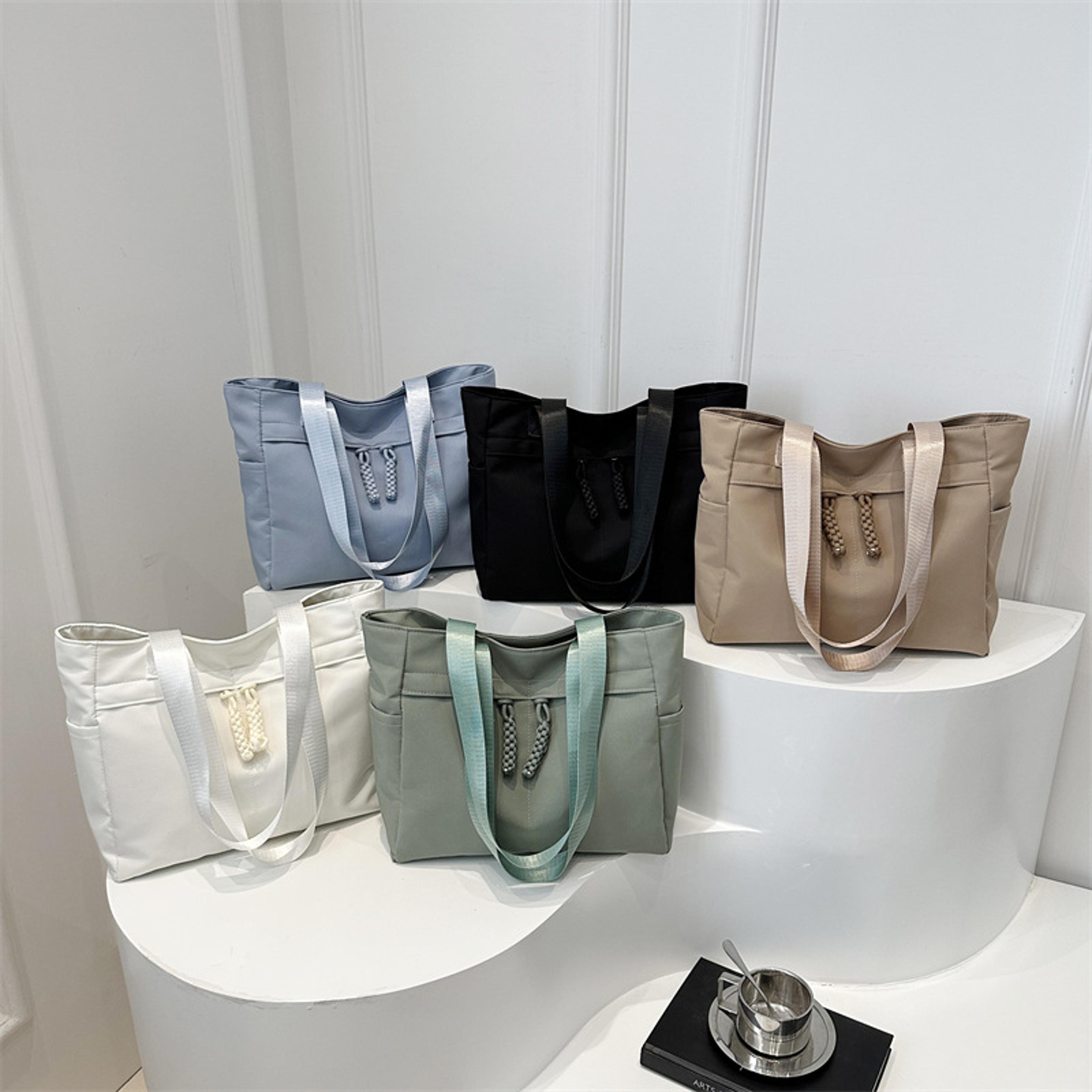 multi pocket nylon tote bag lightweight water resistant work and travel shoulder bag