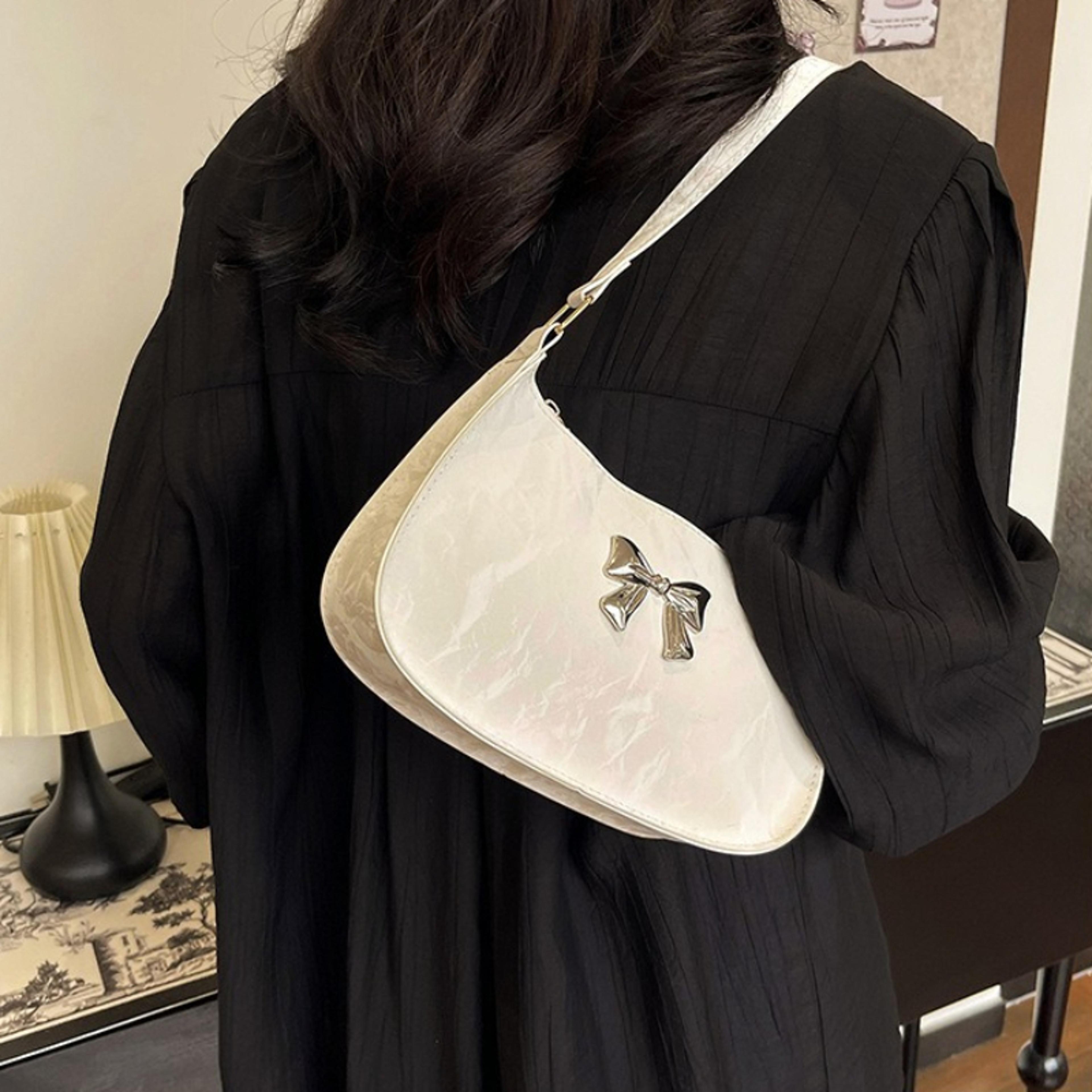 metallic crescent shoulder bag with bow detail for women