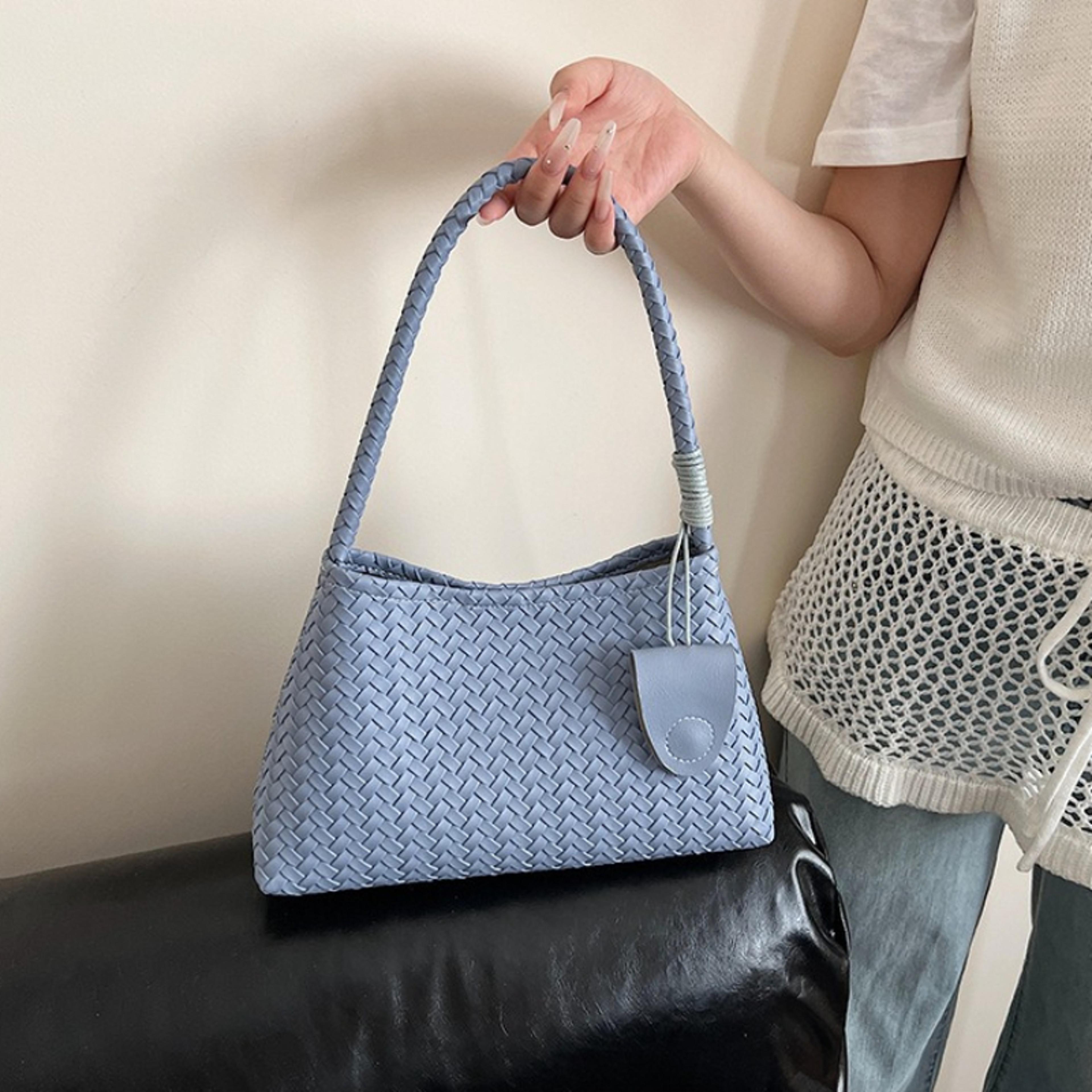 woven faux leather shoulder bag for women with charm detail
