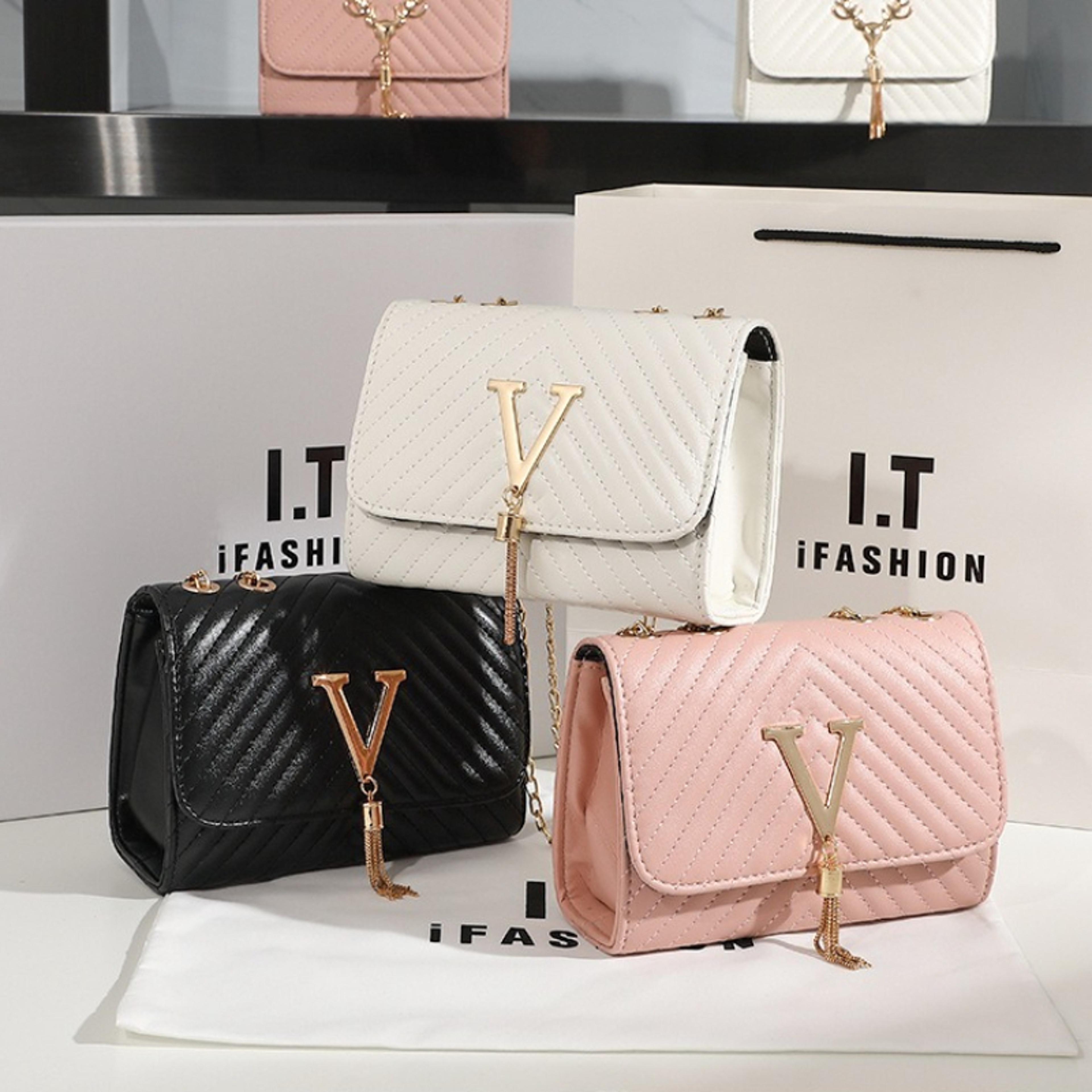 v quilted crossbody bag for women with gold chain and tassel charm