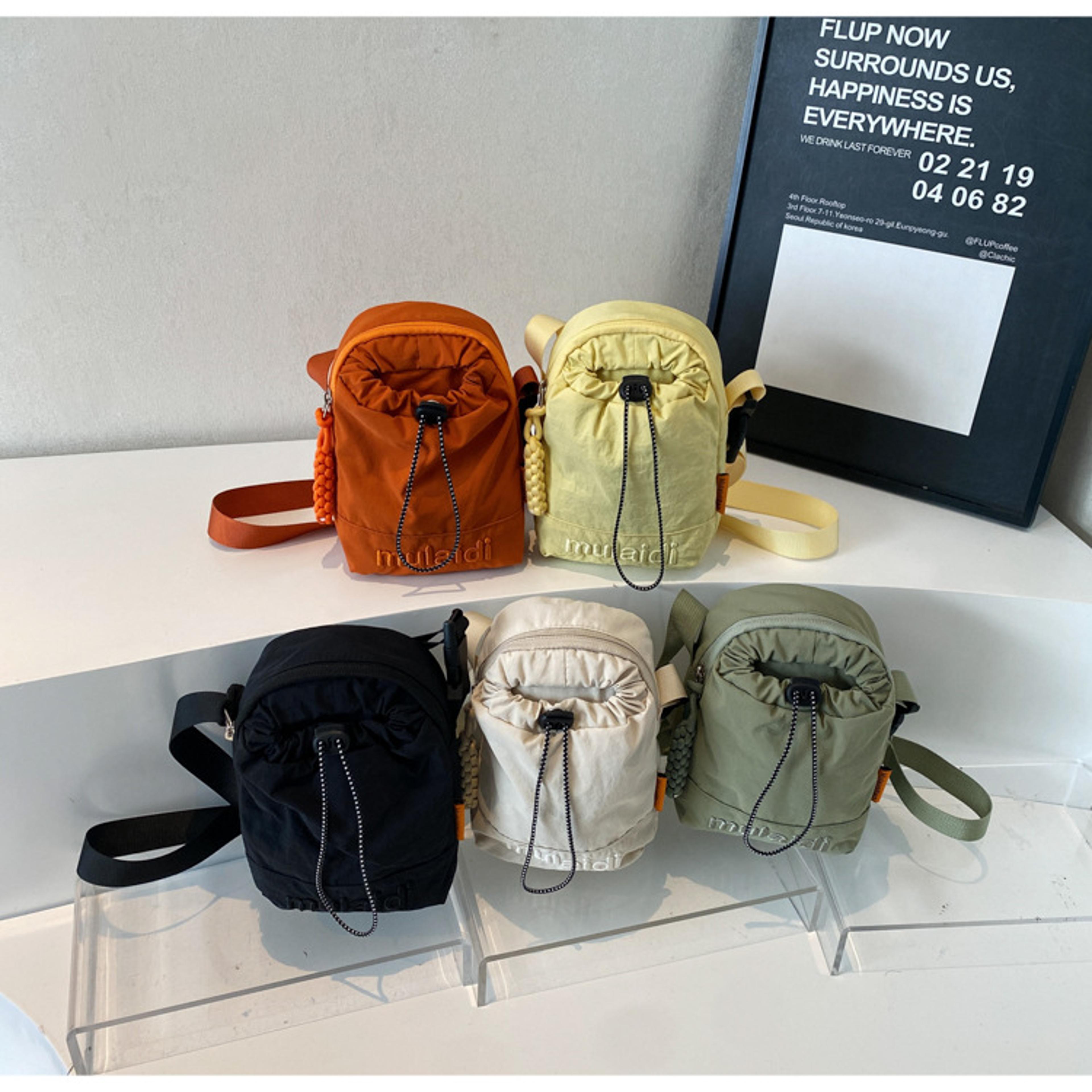 urban mini nylon crossbody bag lightweight drawstring bucket purse